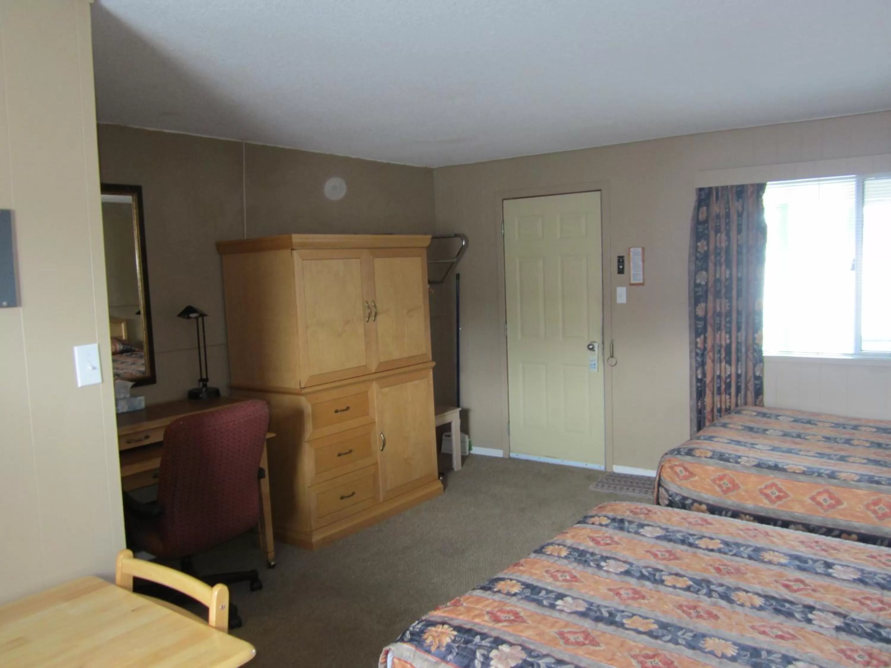 Bed in Bulkley Valley Motel