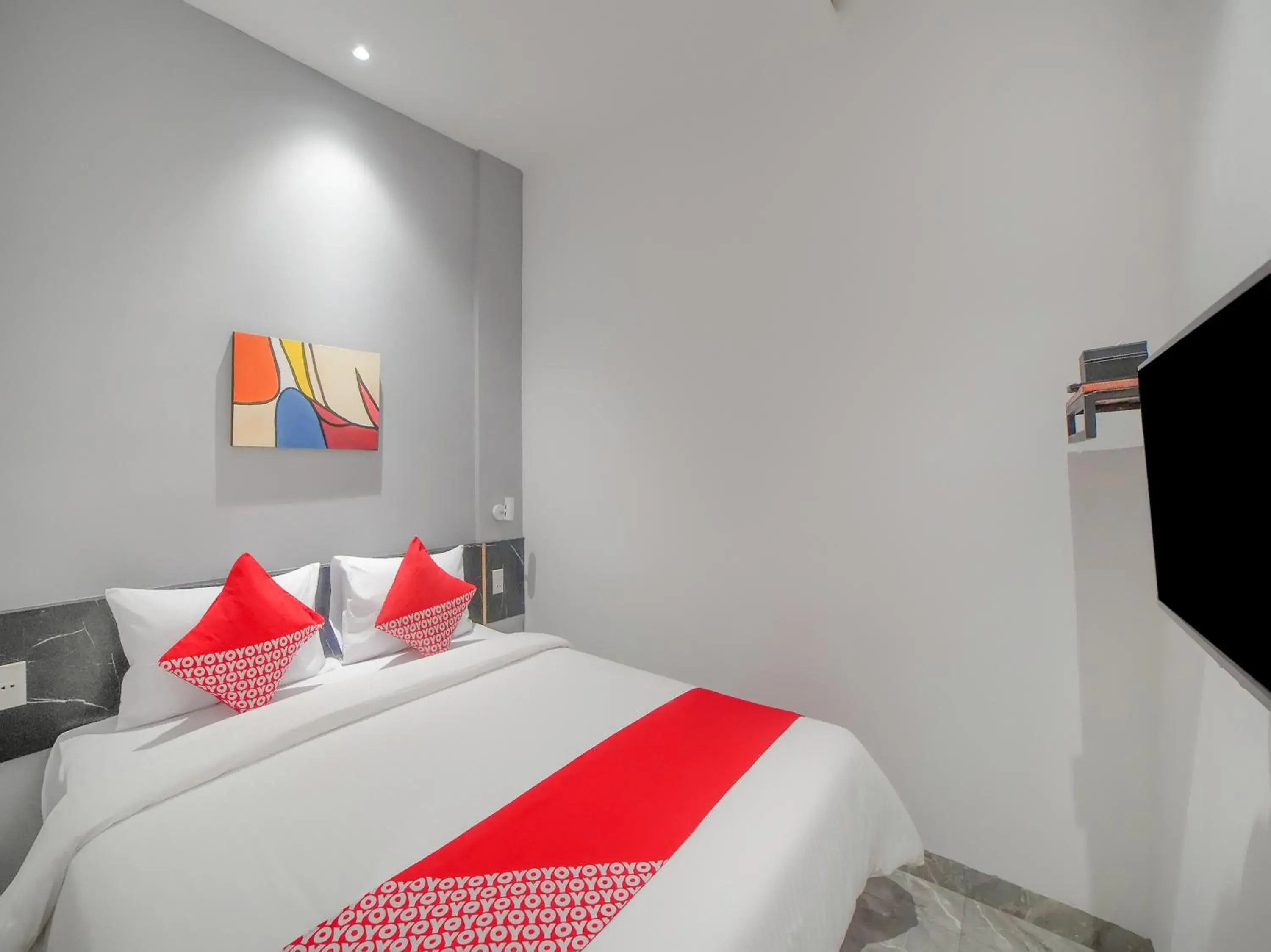 Bedroom in SUPER OYO Capital O 90447 Kardopa Hotel Megapark
