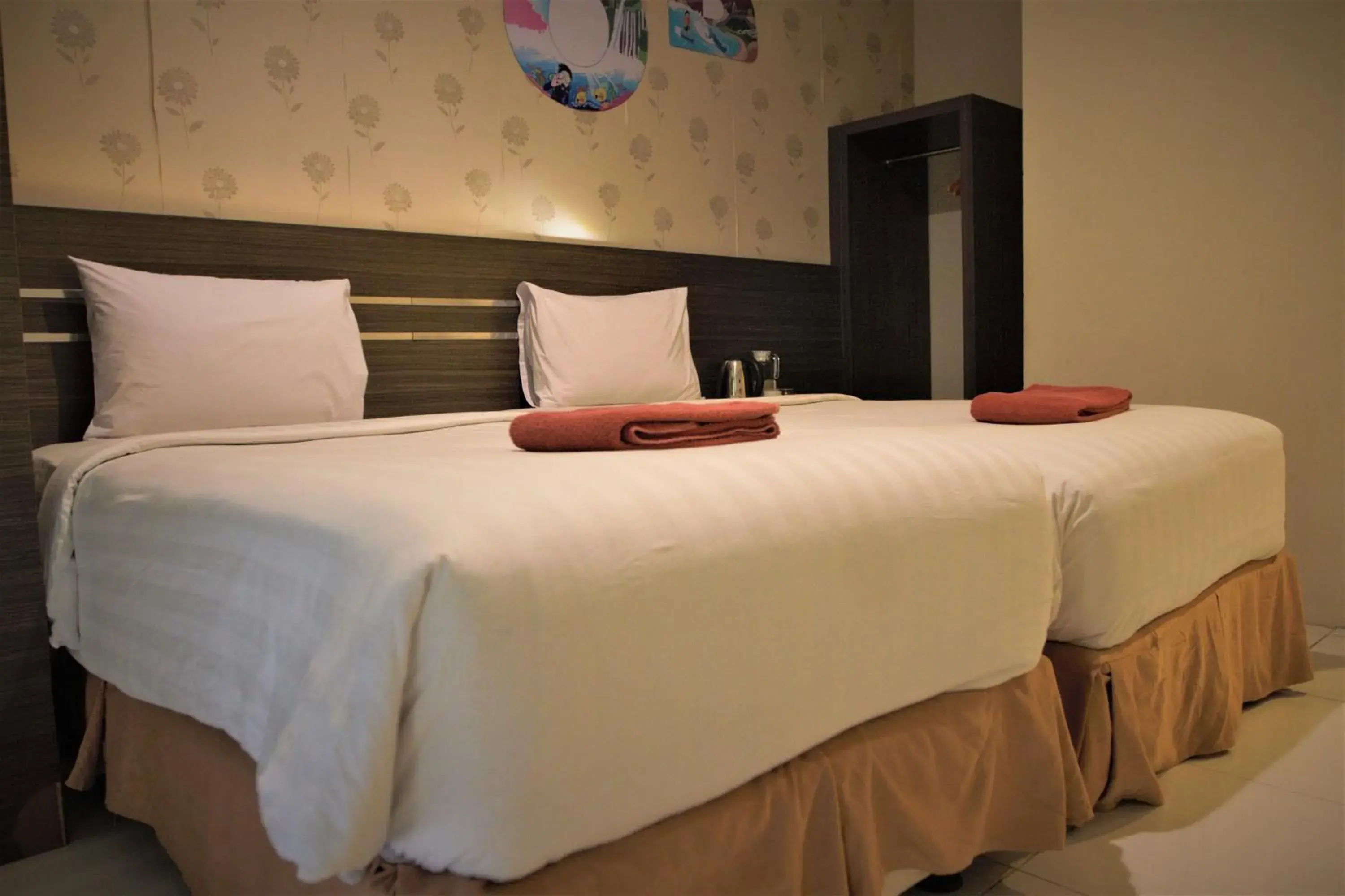 Bed in Nutana Hotel Lombok