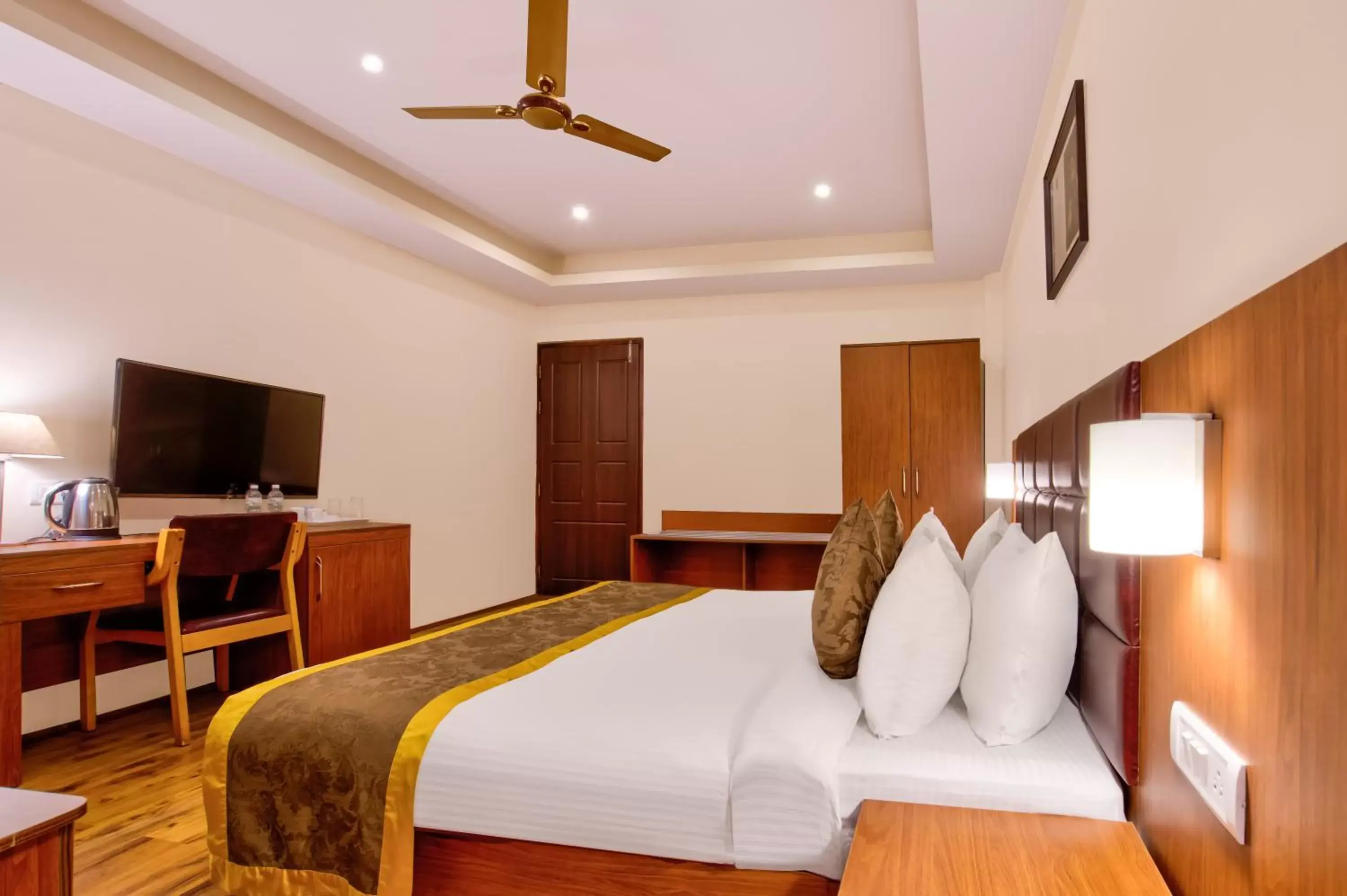 Communal lounge/ TV room, Bed in Summit Ttakshang Residency Hotel & Spa