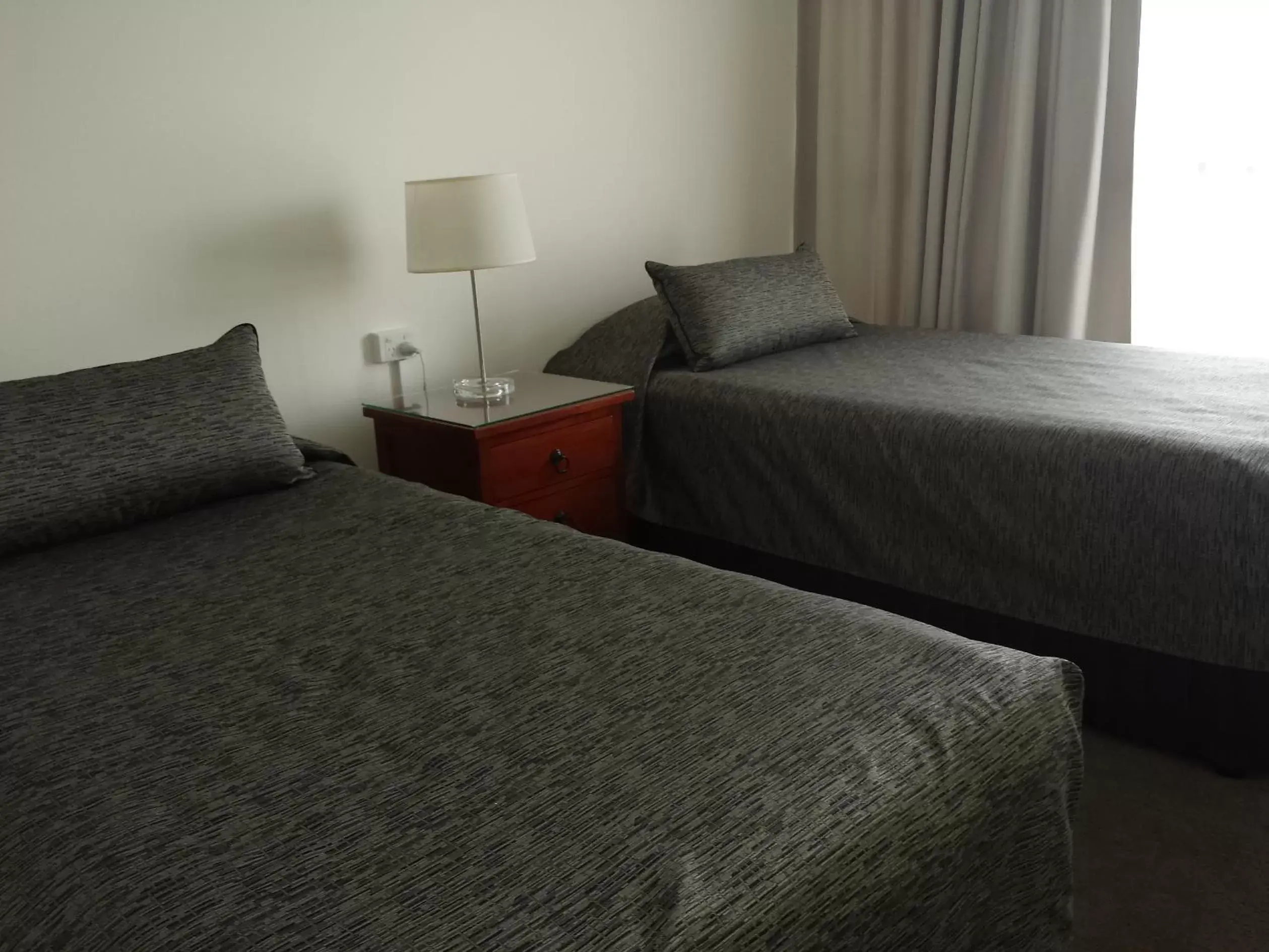 Bed in Kirribilli Apartments