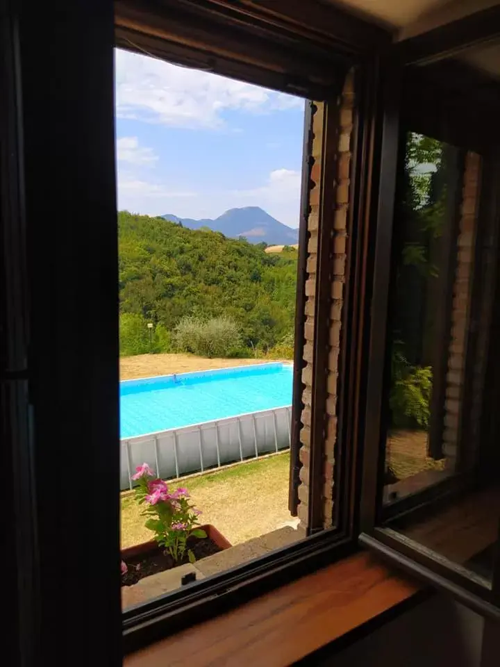 Photo of the whole room, Pool View in Podere le Serre