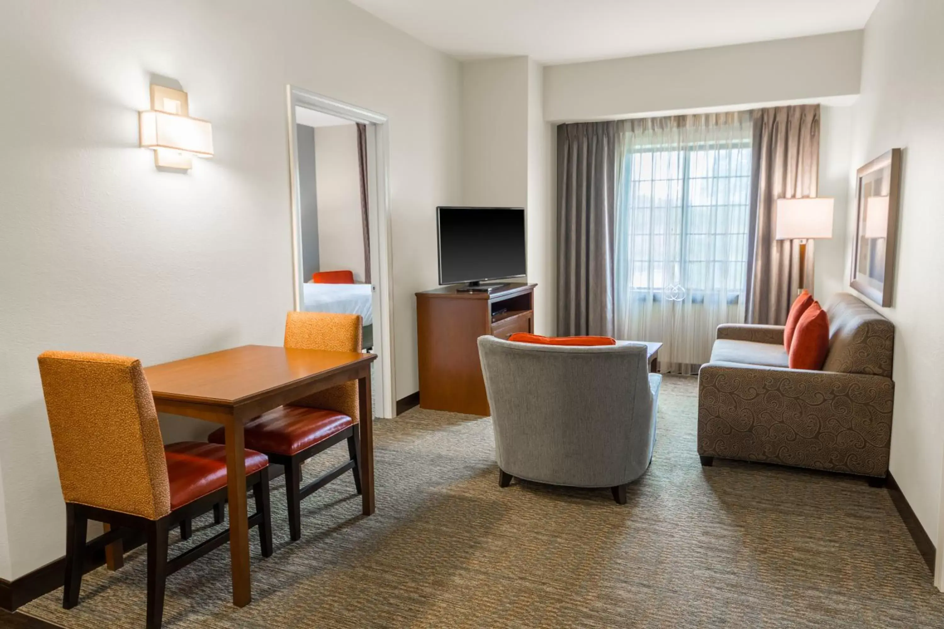 Photo of the whole room, Seating Area in Staybridge Suites - Kansas City-Independence, an IHG Hotel