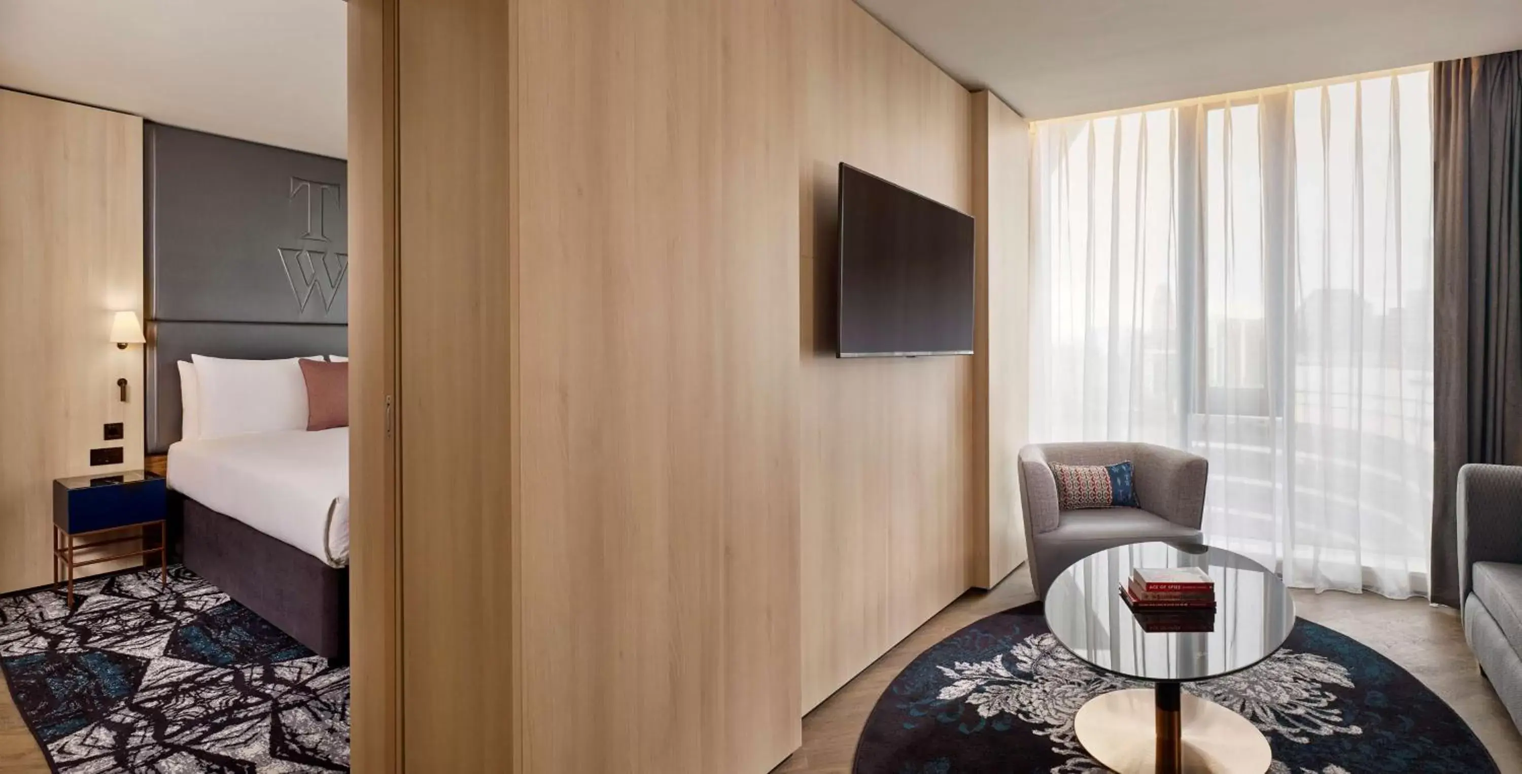 Bed, TV/Entertainment Center in The Westminster London, Curio Collection by Hilton