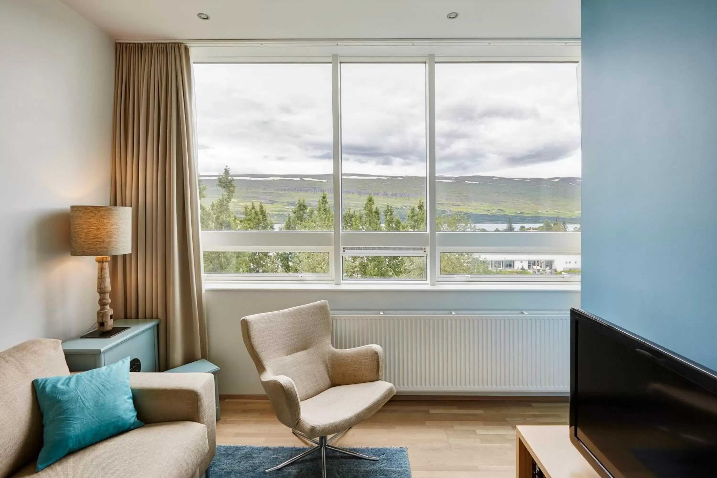 TV and multimedia, Seating Area in Akureyri - Berjaya Iceland Hotels