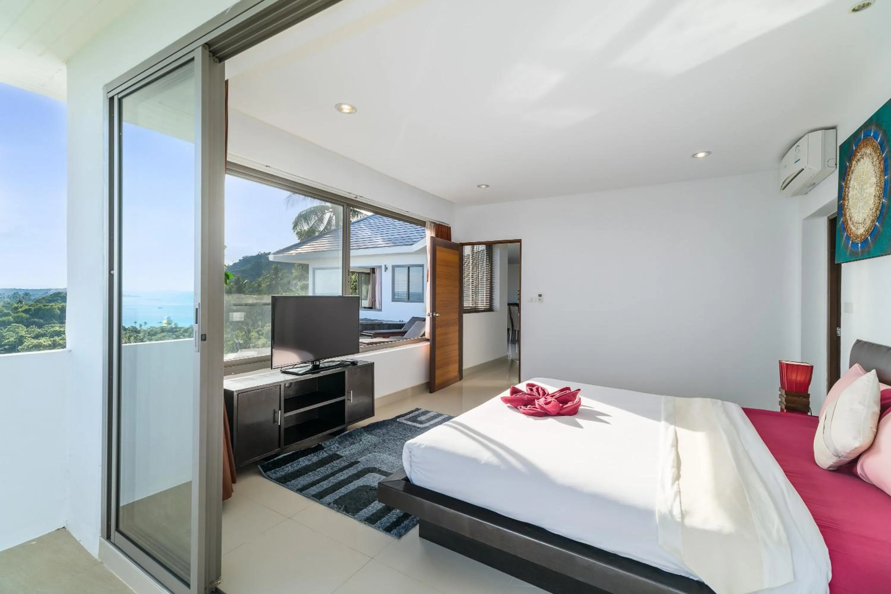 Bed in Tropical Sea View Residence