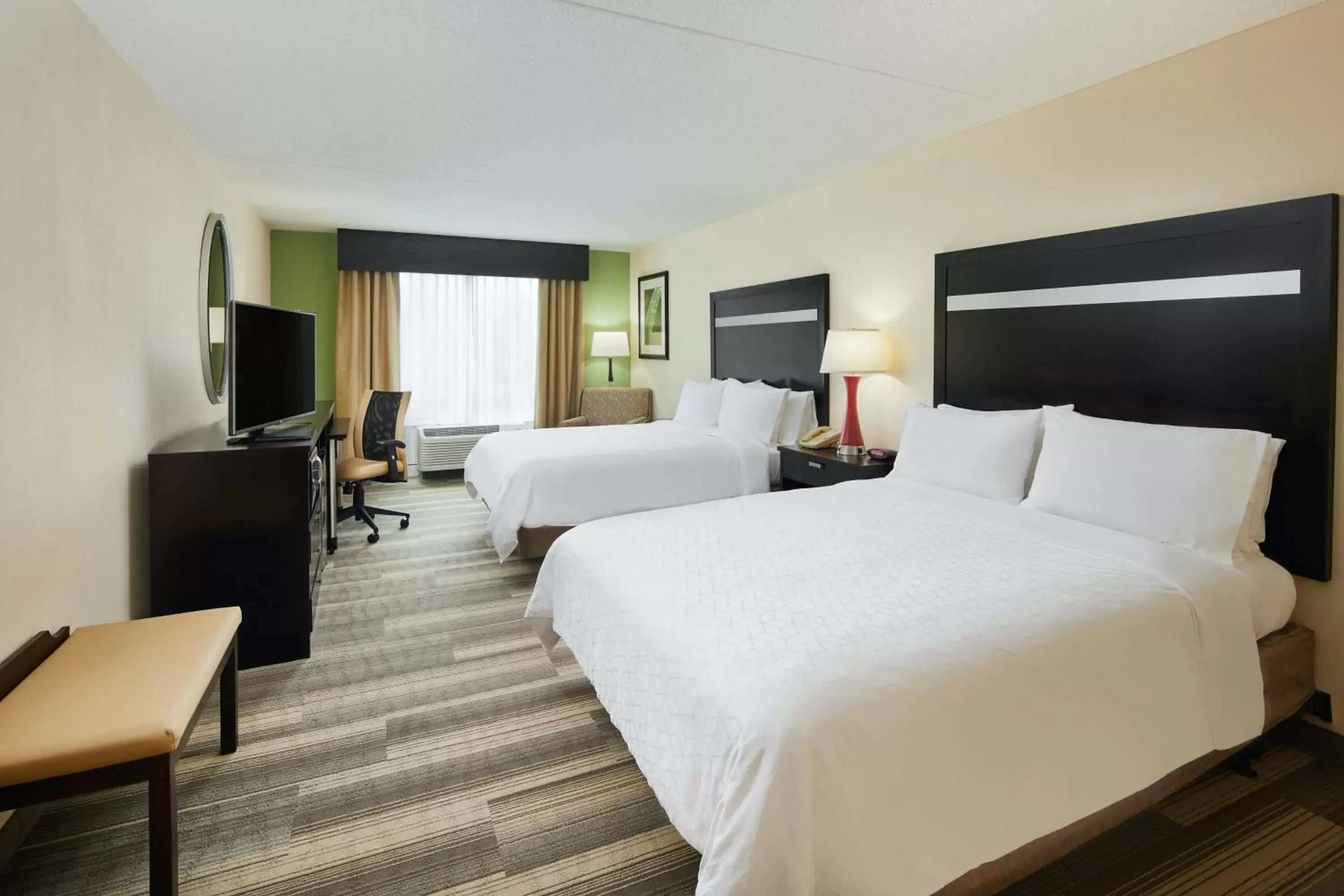 Photo of the whole room in Holiday Inn Express & Suites I-26 & Us 29 At Westgate Mall, an IHG Hotel