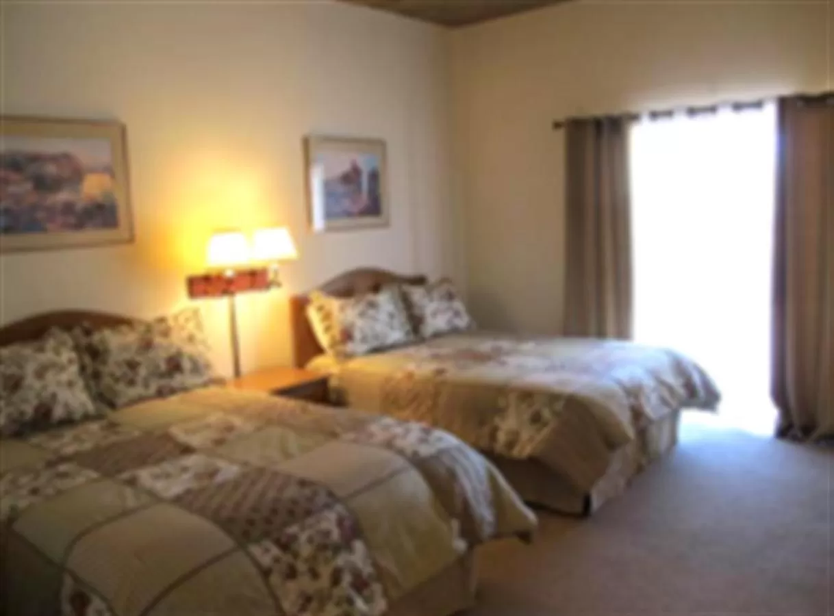 Bed in Stage Stop Inn