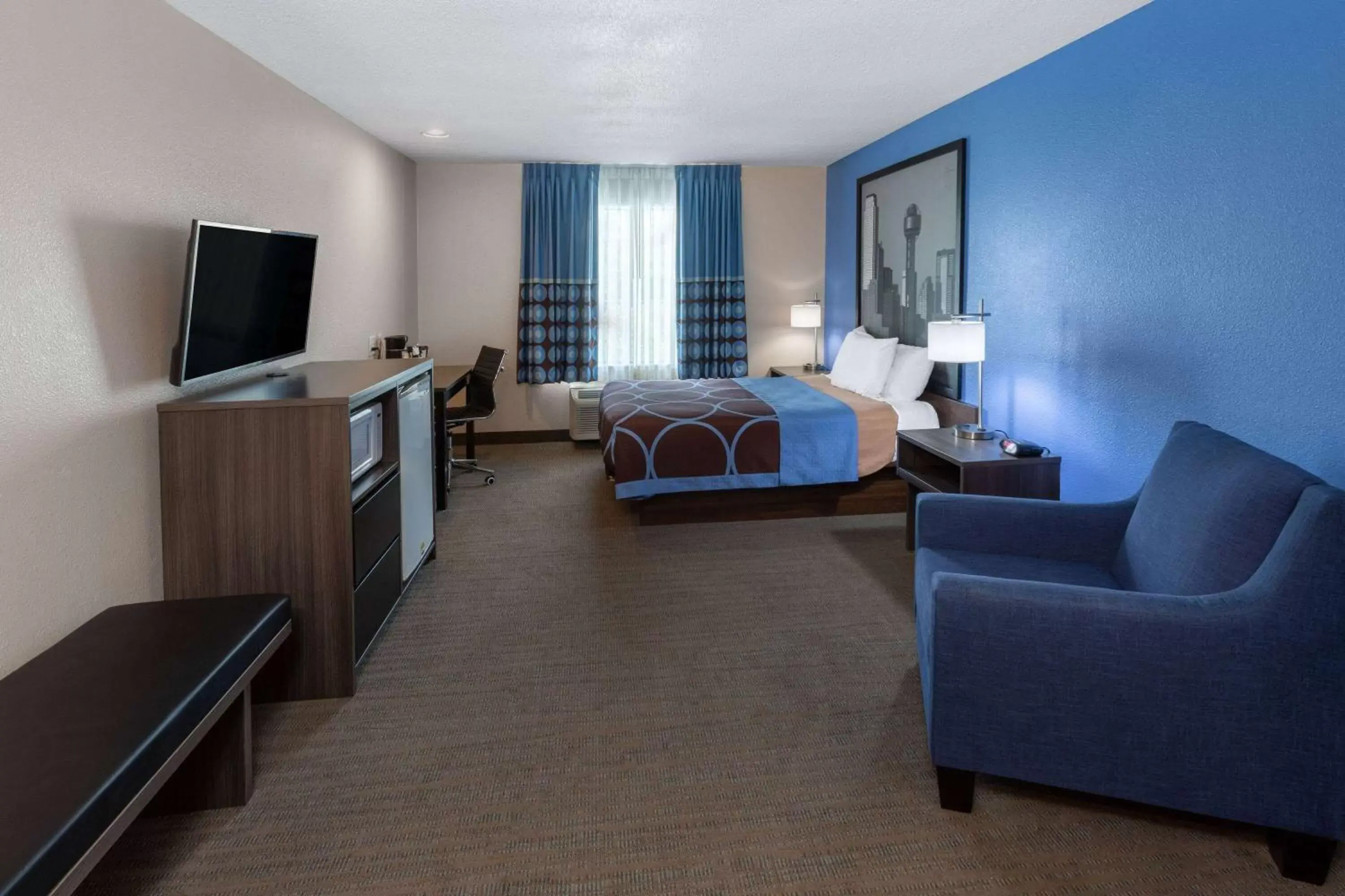 Photo of the whole room, Seating Area in Super 8 by Wyndham Garland/Rowlett/East Dallas area