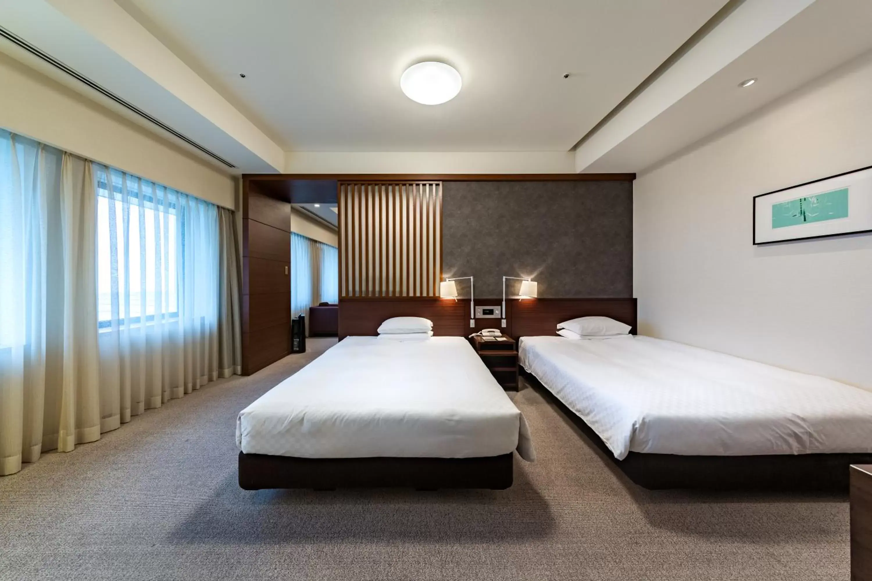 Bed in Centrair Hotel