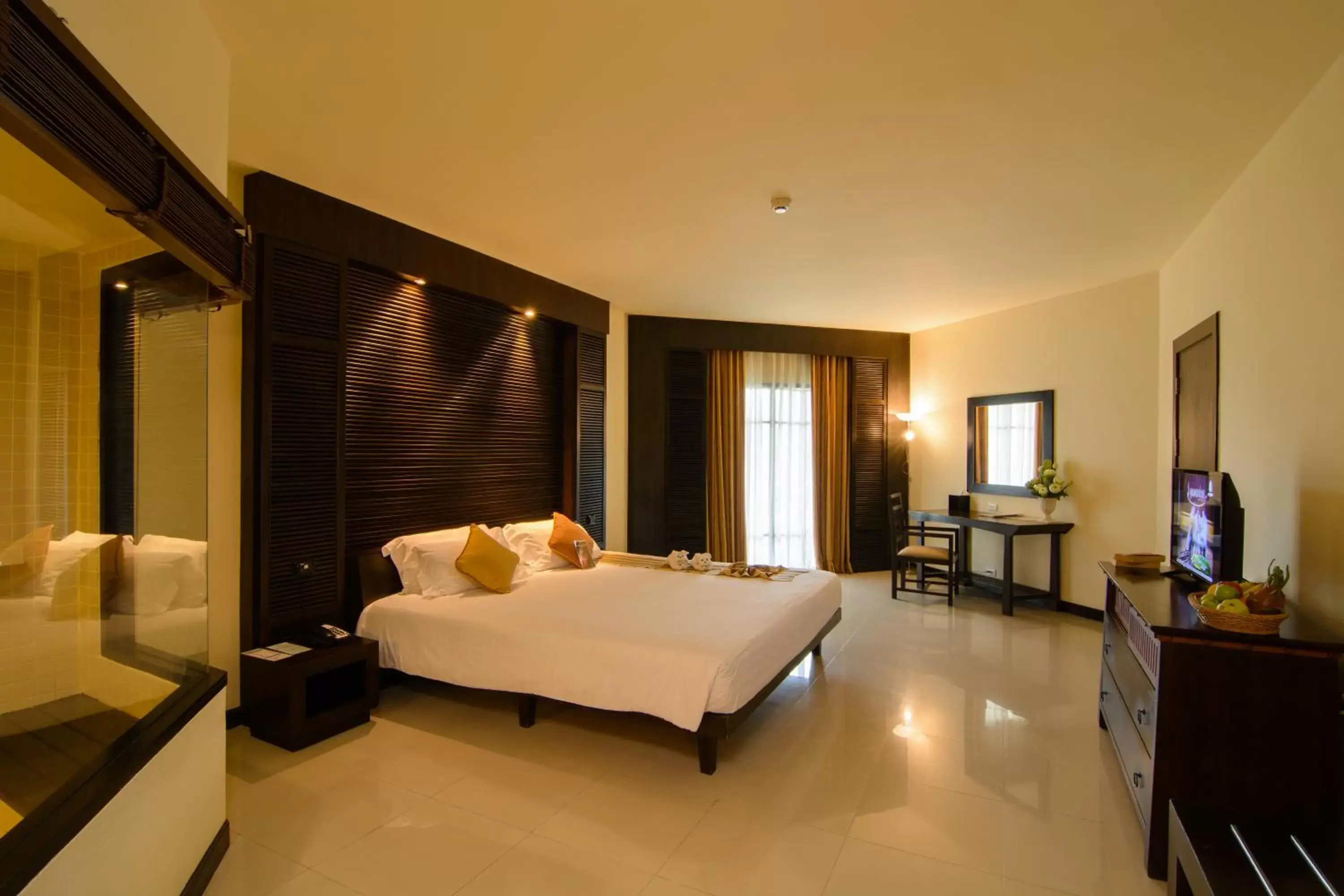 Bed in The Nouveau Chumphon Beach Resort And Golf Bed in The Nouveau Chumphon Beach Resort And Golf