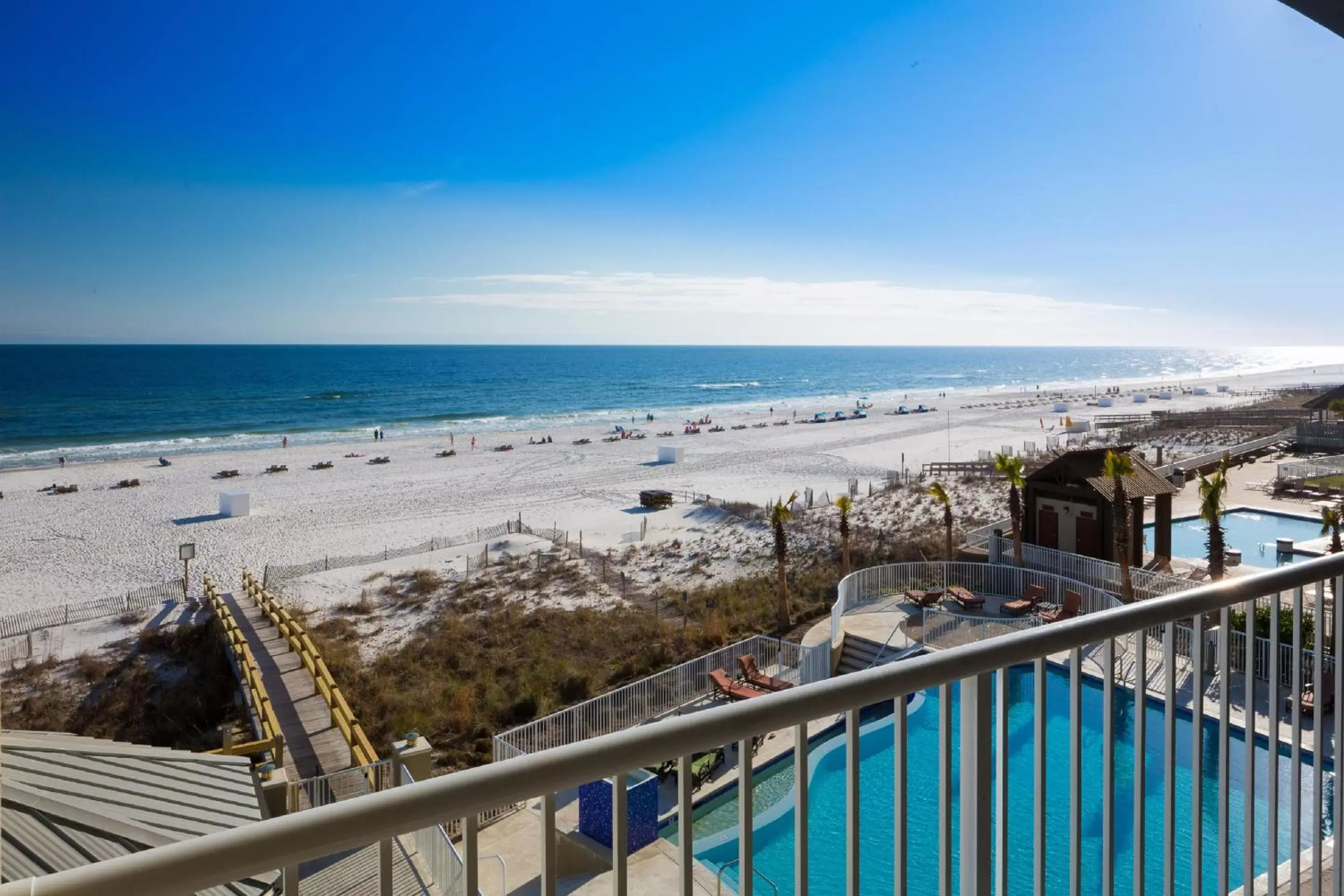 Balcony/Terrace, Pool View in Escapes! To The Shores Orange Beach, A Ramada by Wyndham
