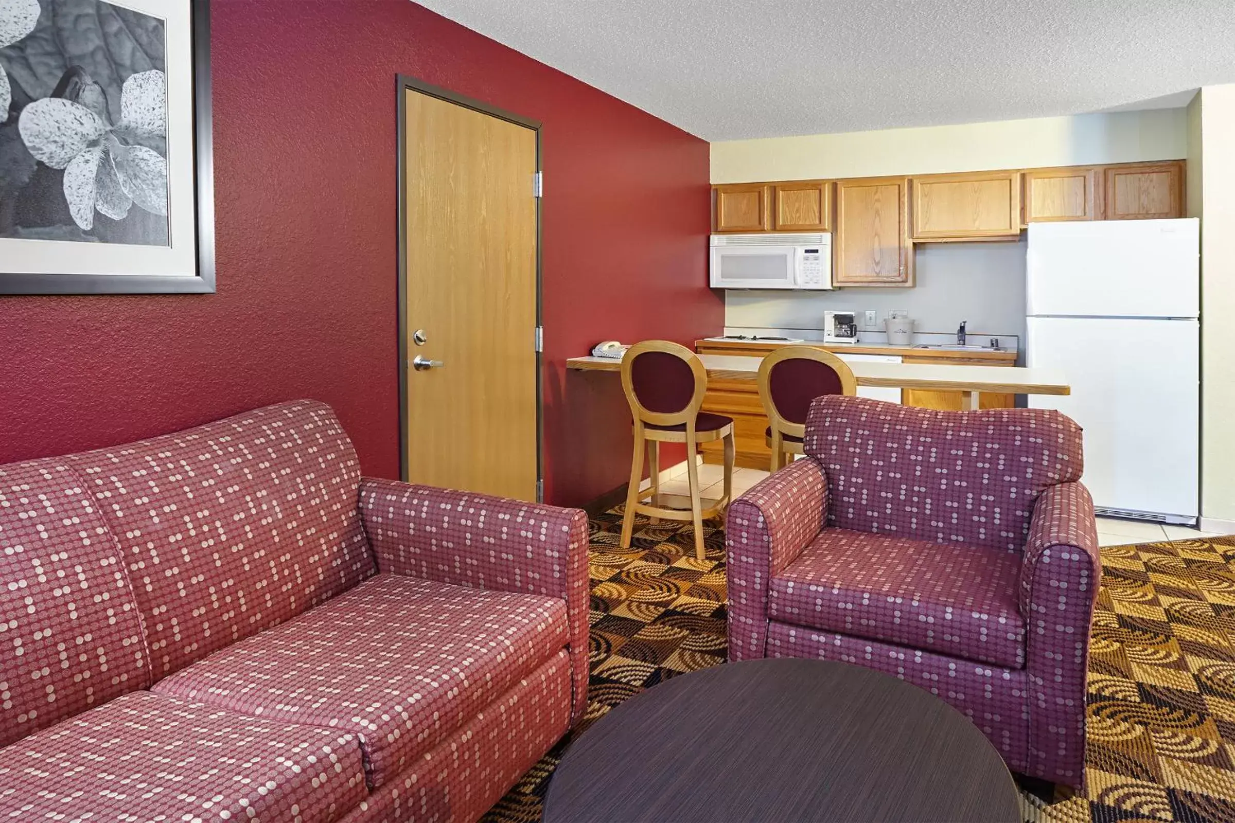 Photo of the whole room, Seating Area in AmericInn by Wyndham Elkhorn Near Lake Geneva