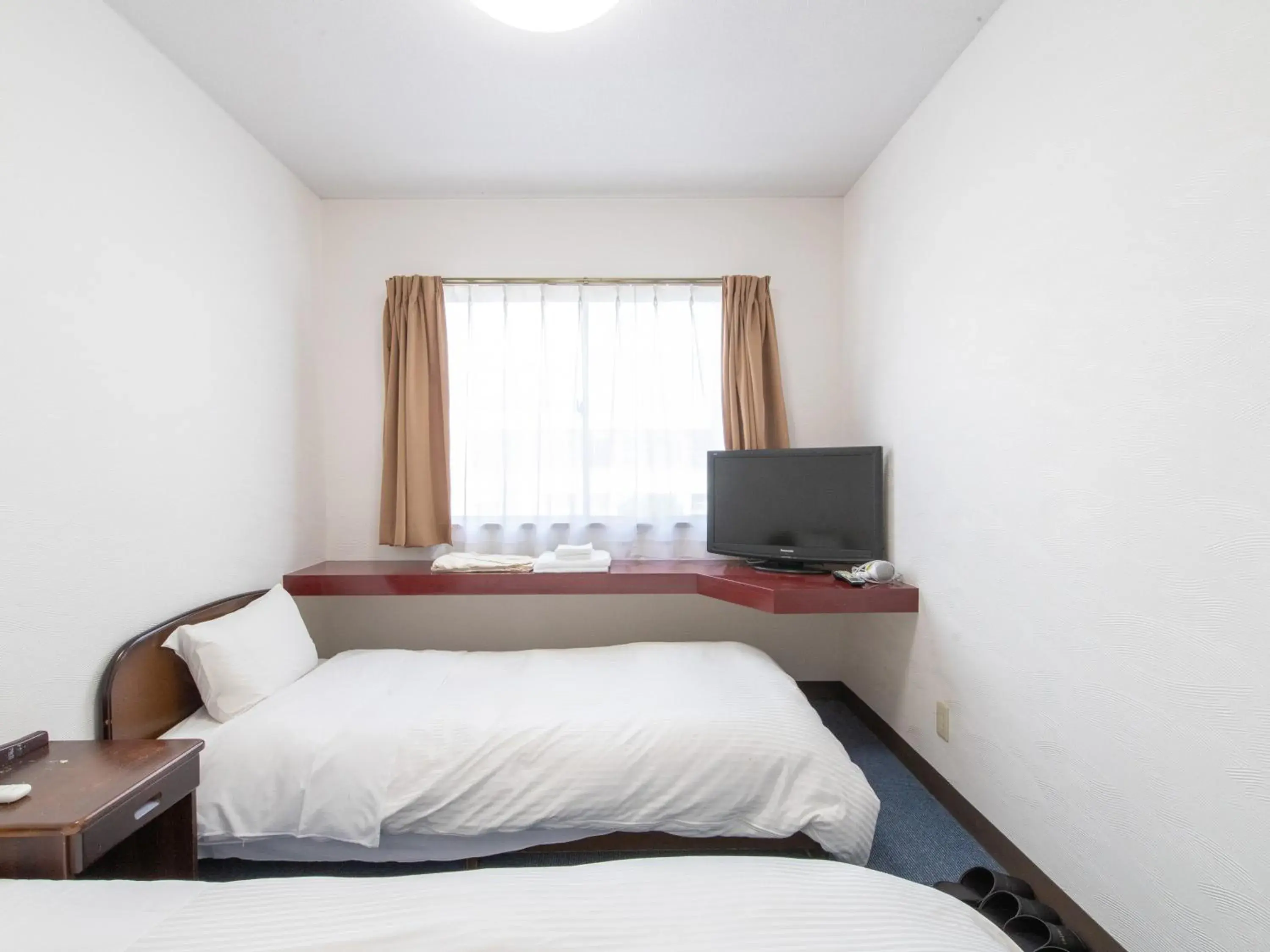 Photo of the whole room, Bed in Tabist Rays Hotel Suisen