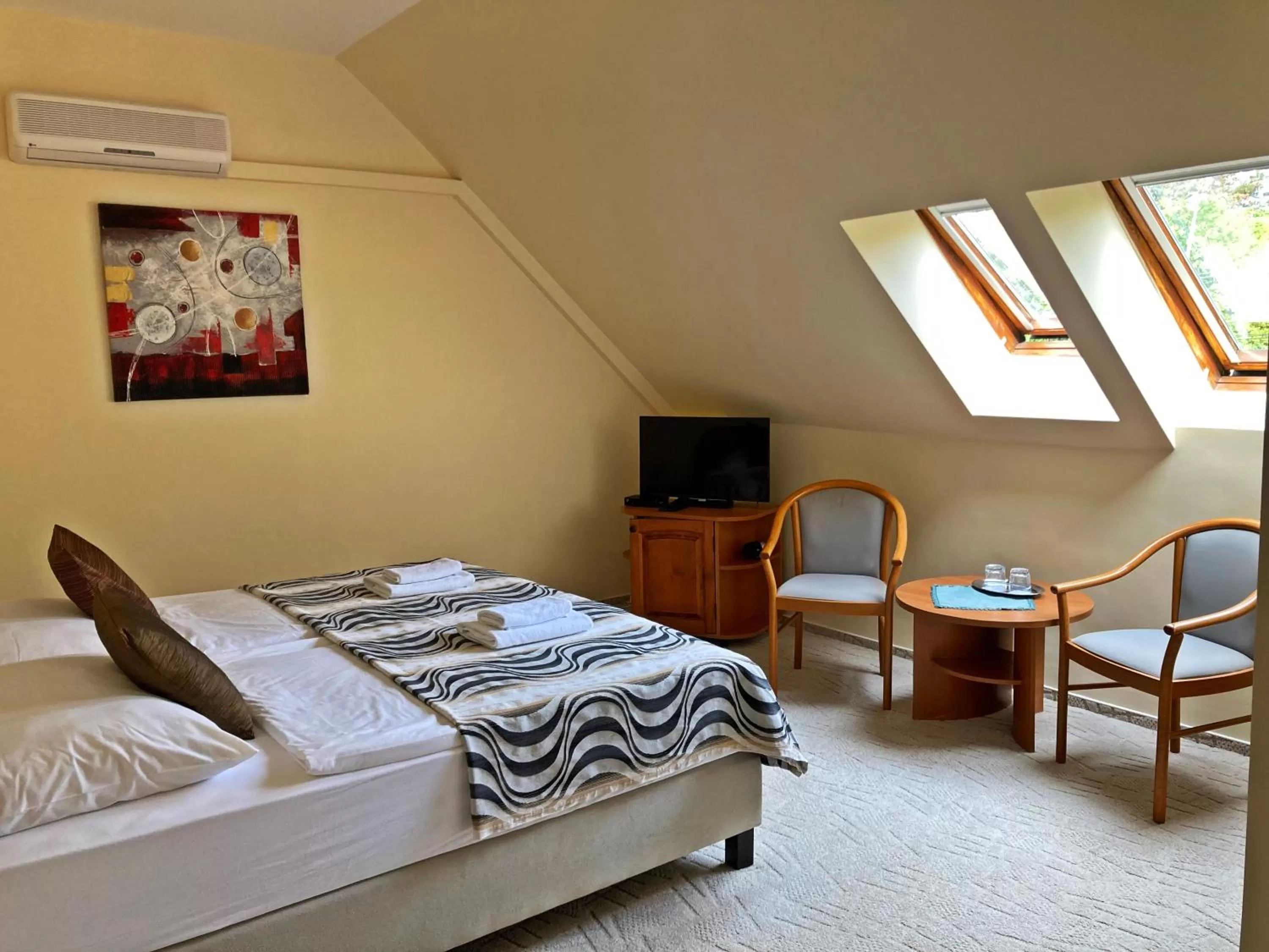 Bed in Hotel Penta Lux