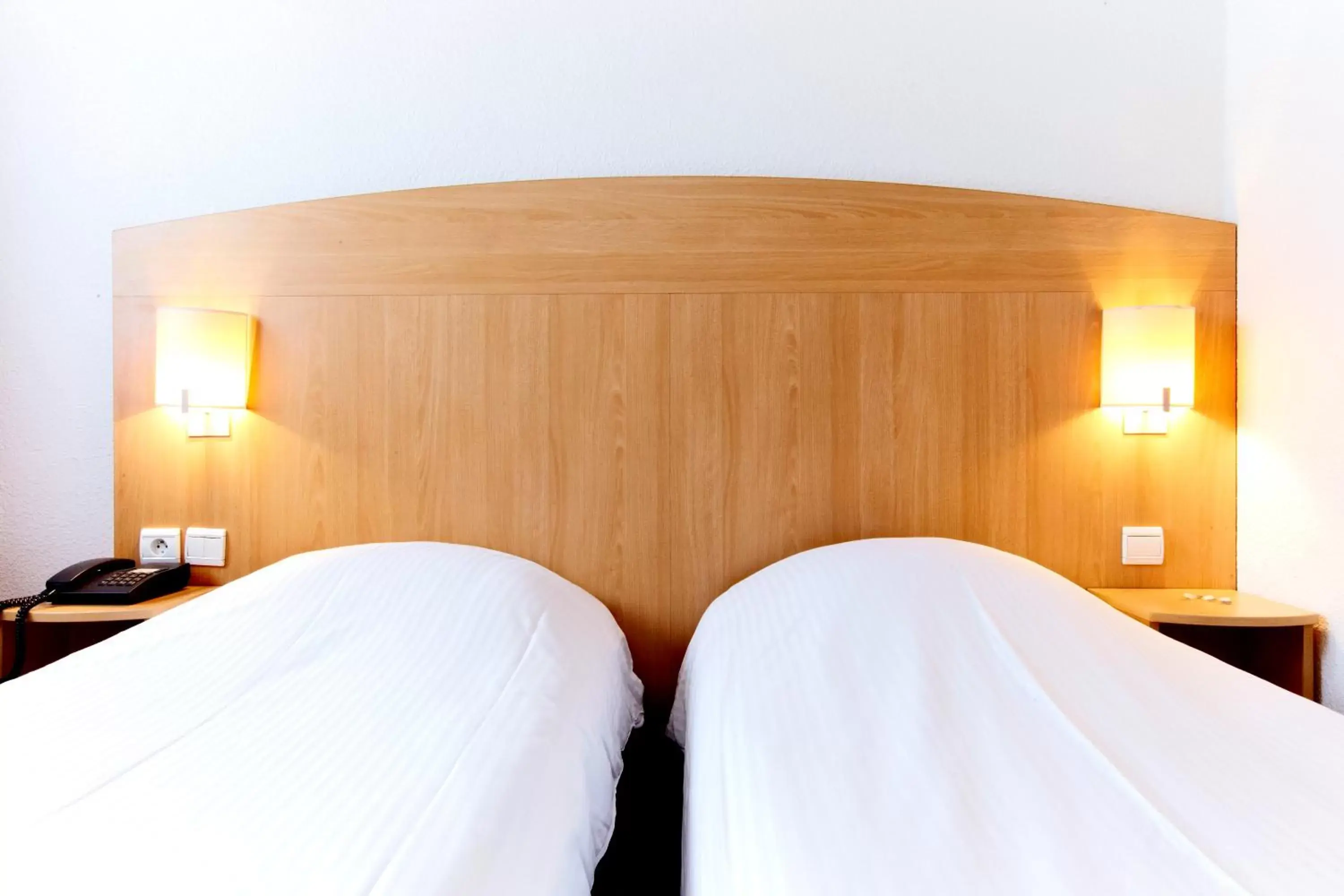 Bed in Hôtel Restaurant Kyriad Mulhouse Nord Illzach Bed in Hôtel Restaurant Kyriad Mulhouse Nord Illzach