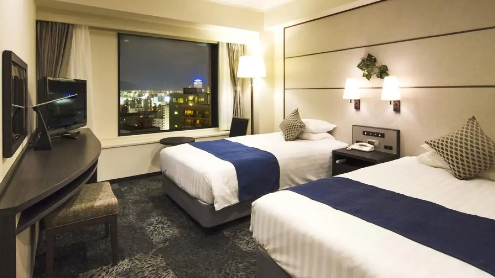 Photo of the whole room, Bed in Premier Hotel Nakajima Park Sapporo