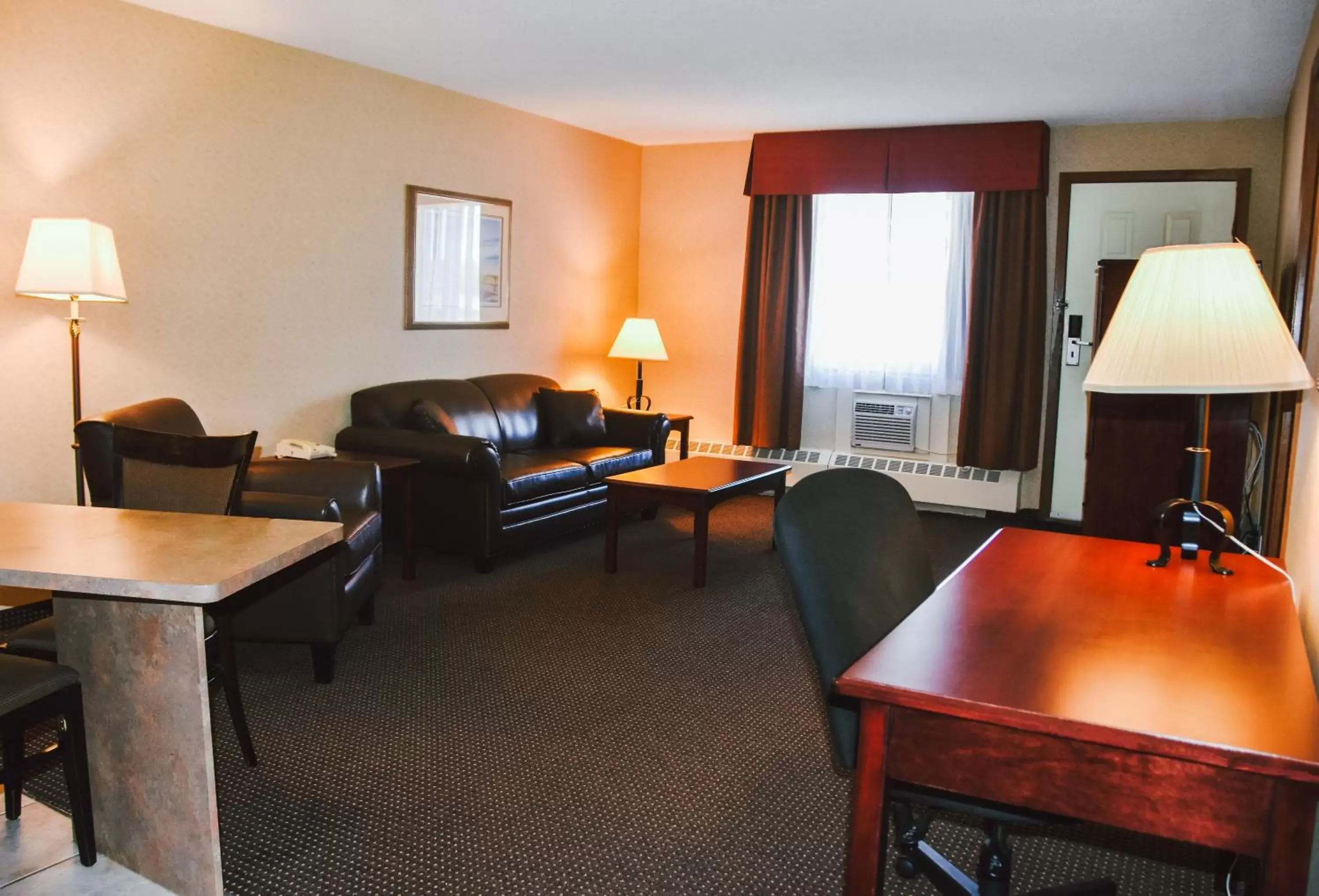 Photo of the whole room, Seating Area in Stony Plain Inn & Suites