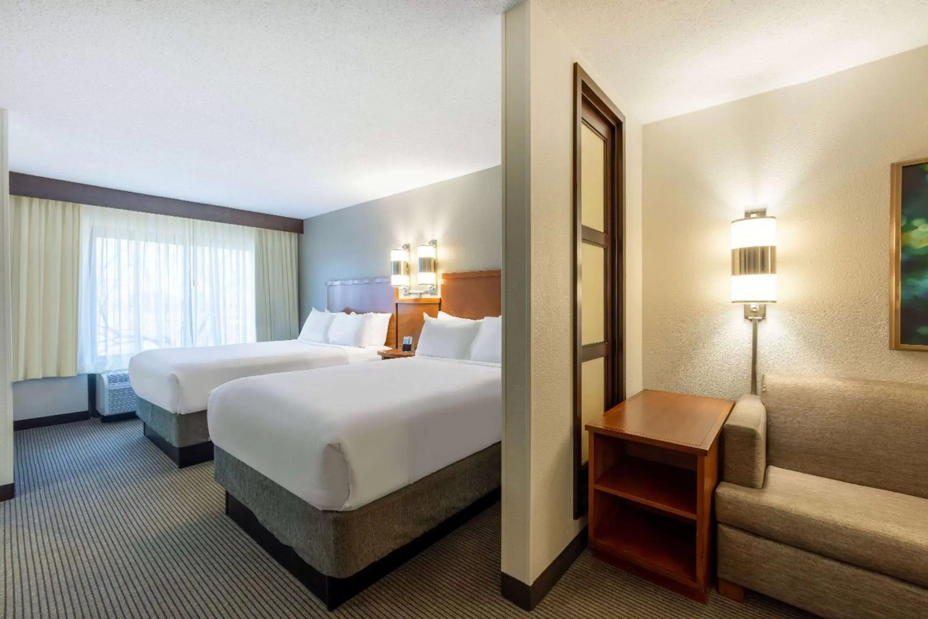 Photo of the whole room, Bed in Wyndham Garden Kansas City Airport