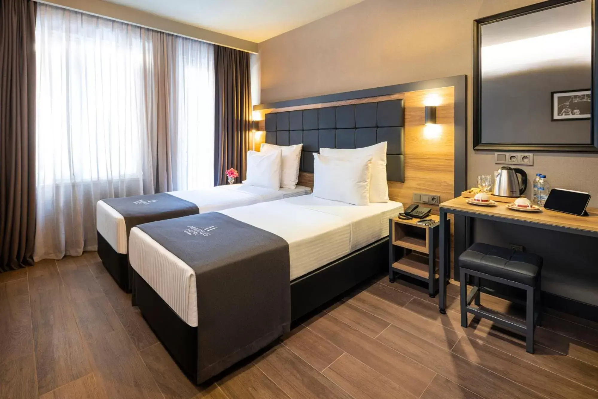 Bed in Marius Hotel Bed in Marius Hotel