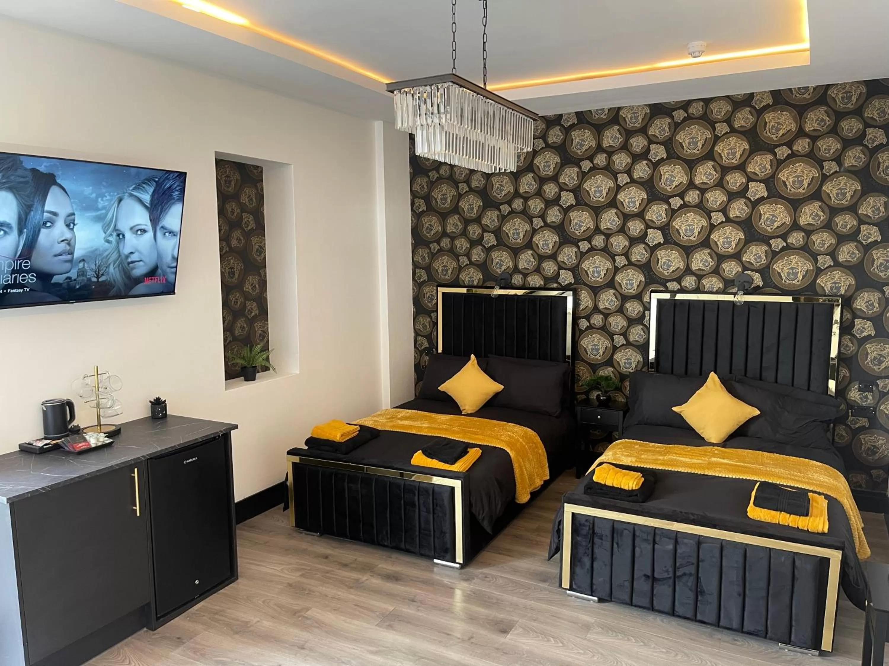 Bed in RESIDENCY LUXURY SEAFRONT HOTEL