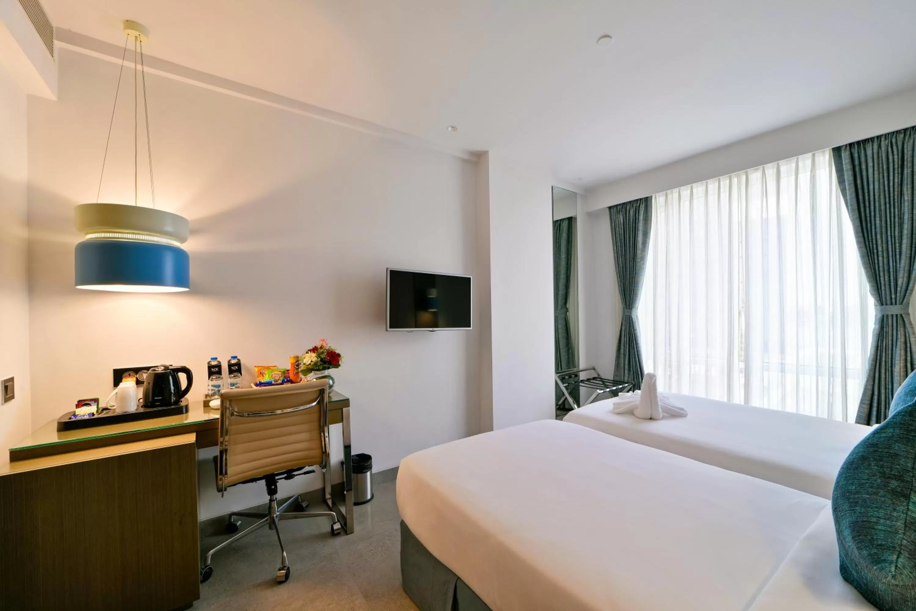 Photo of the whole room in NX HOTEL