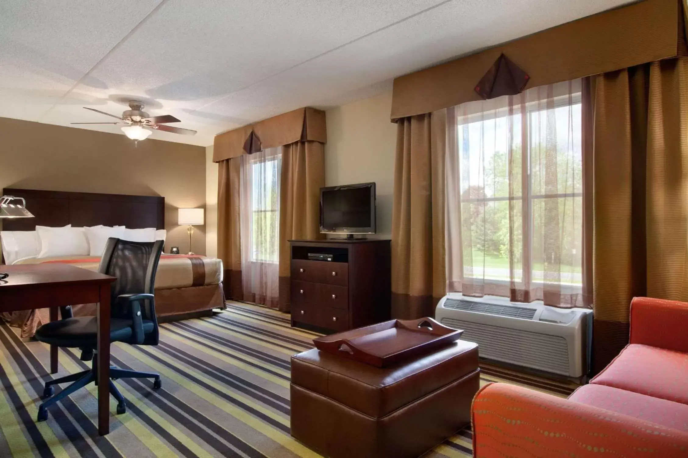 Bed, TV/Entertainment Center in Homewood Suites by Hilton Rochester/Greece, NY