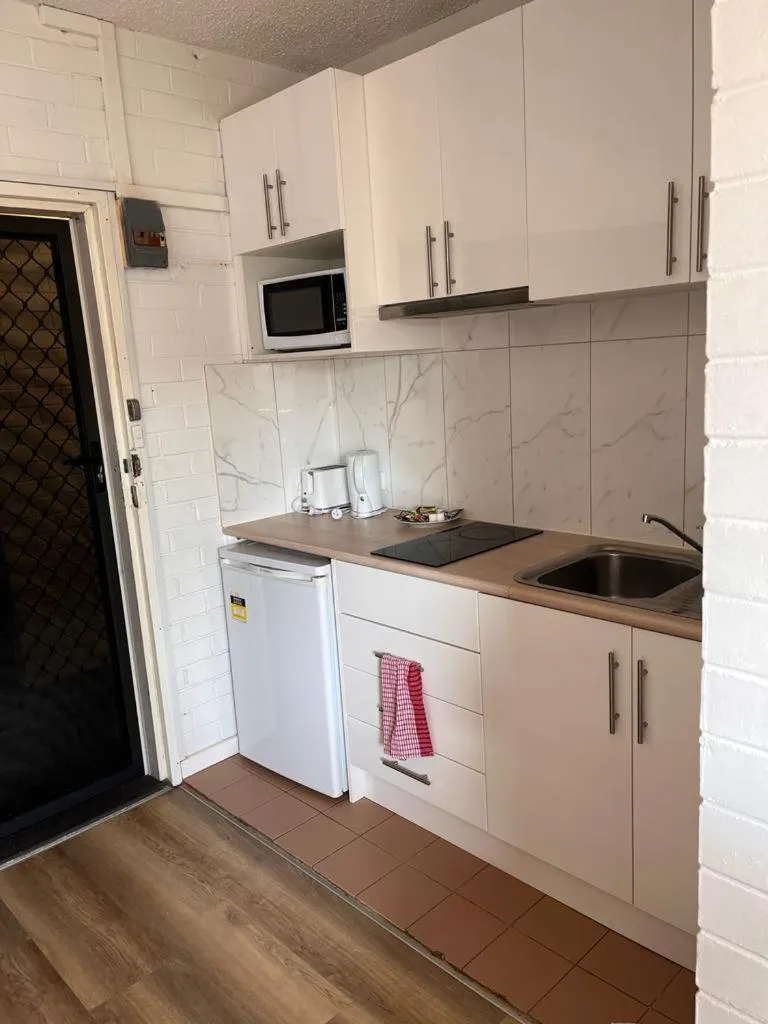 Kitchen or kitchenette in H & D Apartments