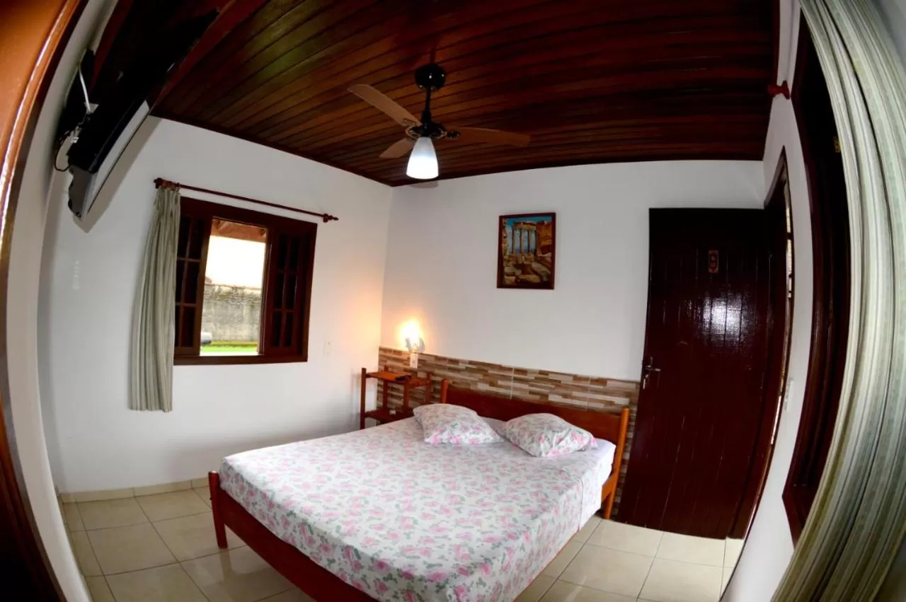 Bed in Cantinho da Geisa - suítes mobiliadas