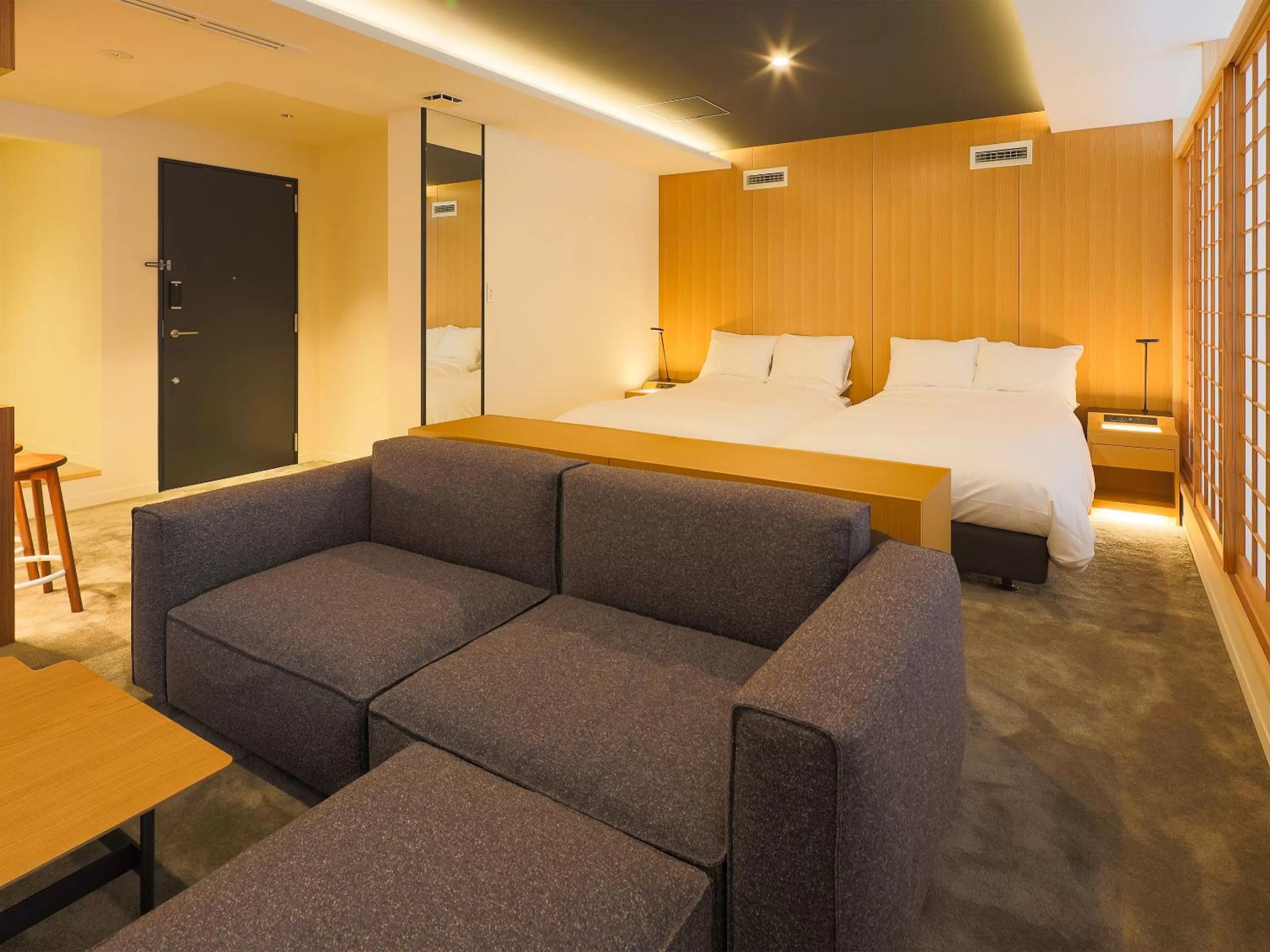 Living room, Bed in Hotel Muso