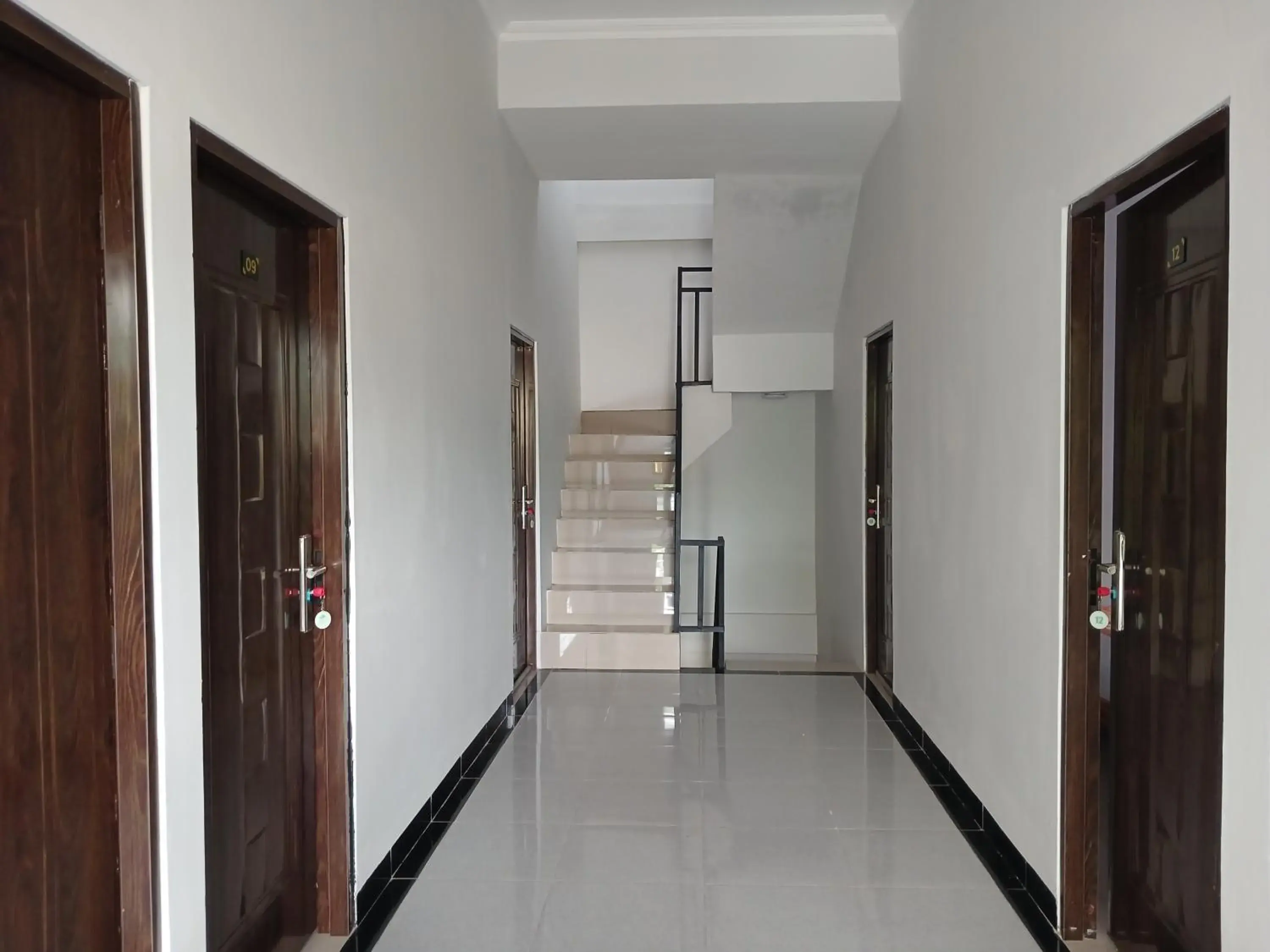 Lobby or reception in OYO 93085 Homy Stay Syariah