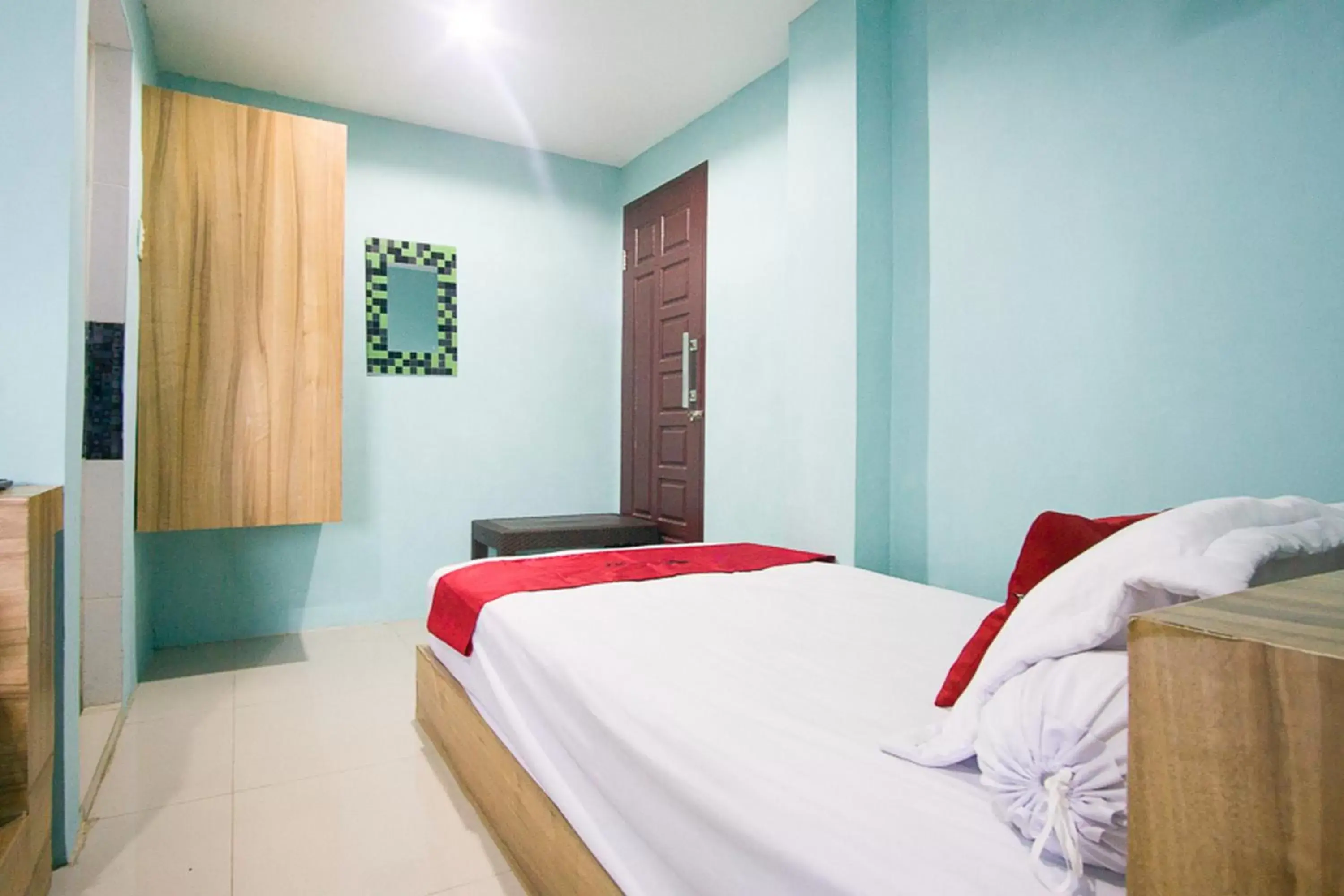 Bedroom, Bed in RedDoorz near Mikie Holiday Funland Berastagi