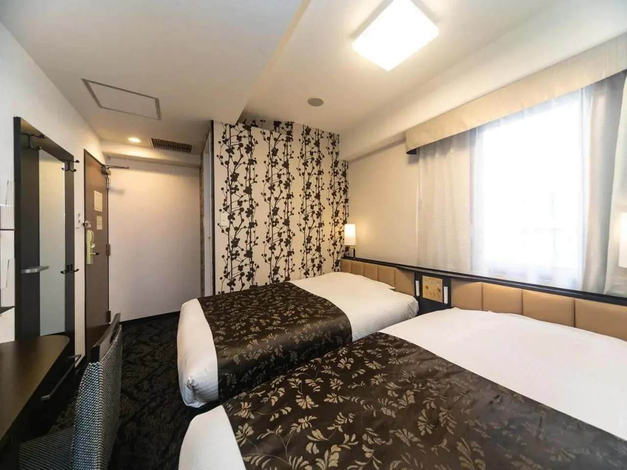 Photo of the whole room, Bed in APA Hotel Namba Kita Shinsaibashi Ekimae