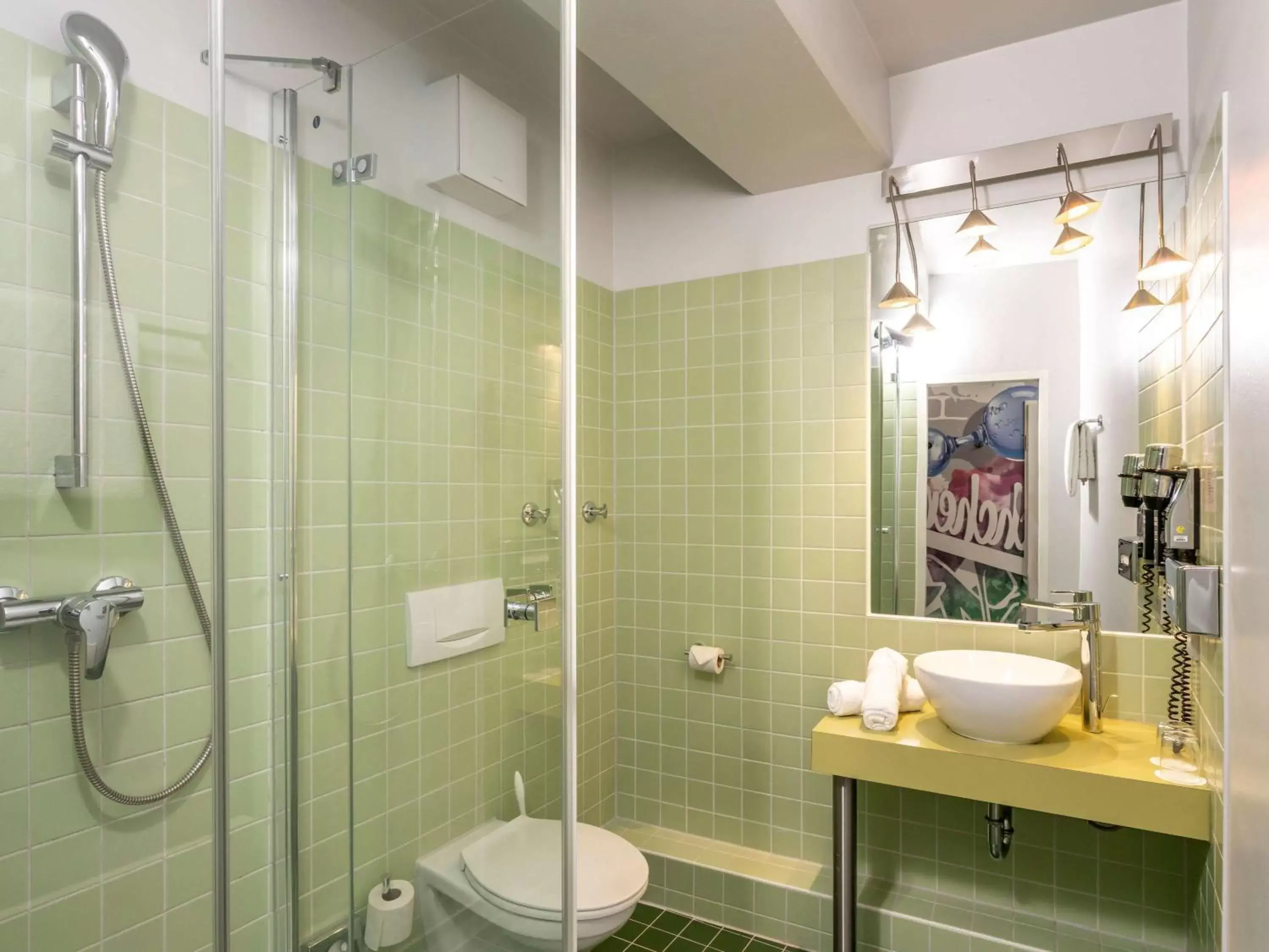 Bathroom in ibis Styles Hamburg Alster City