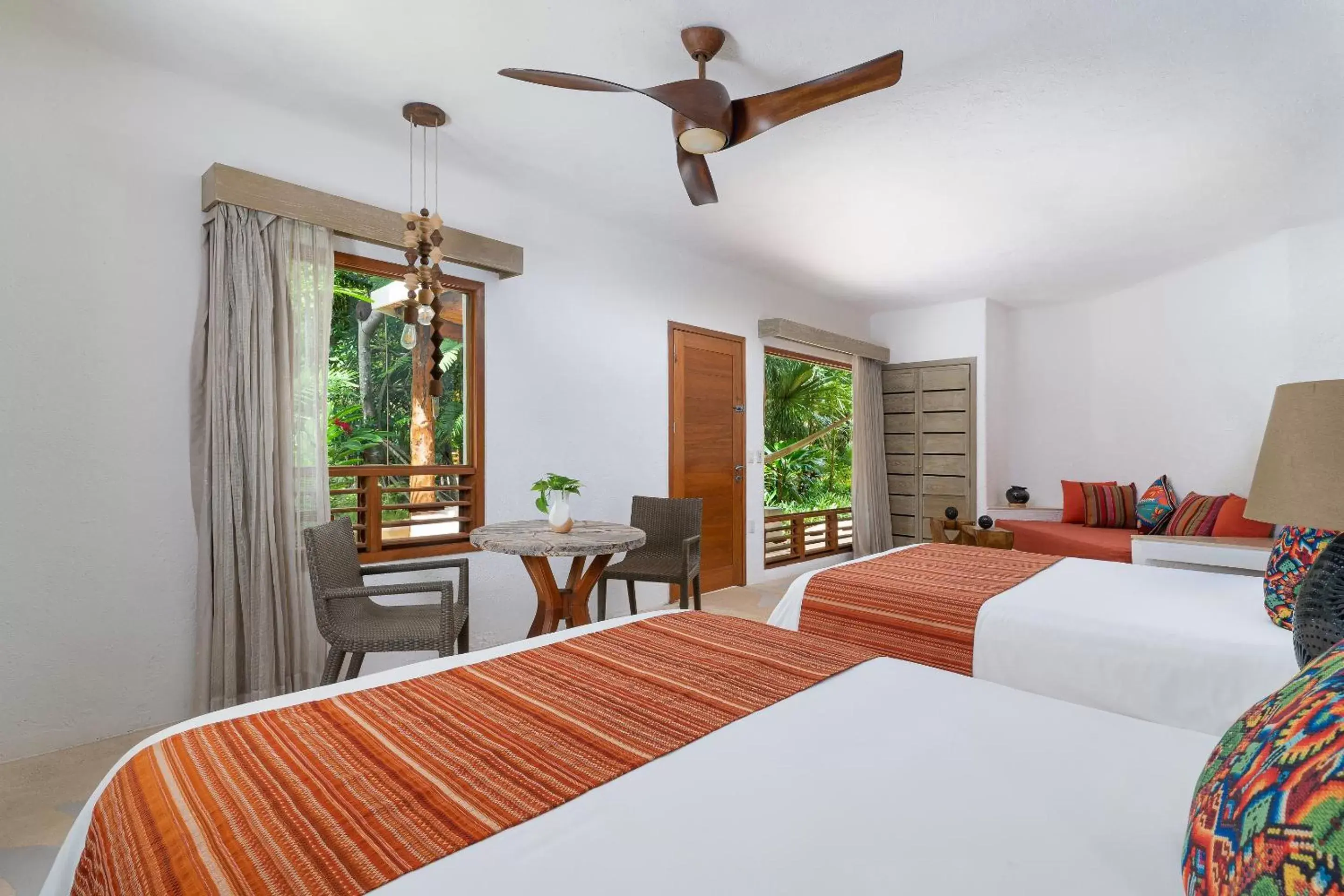 Bedroom, Bed in Mahekal Beach Front Resort & Spa