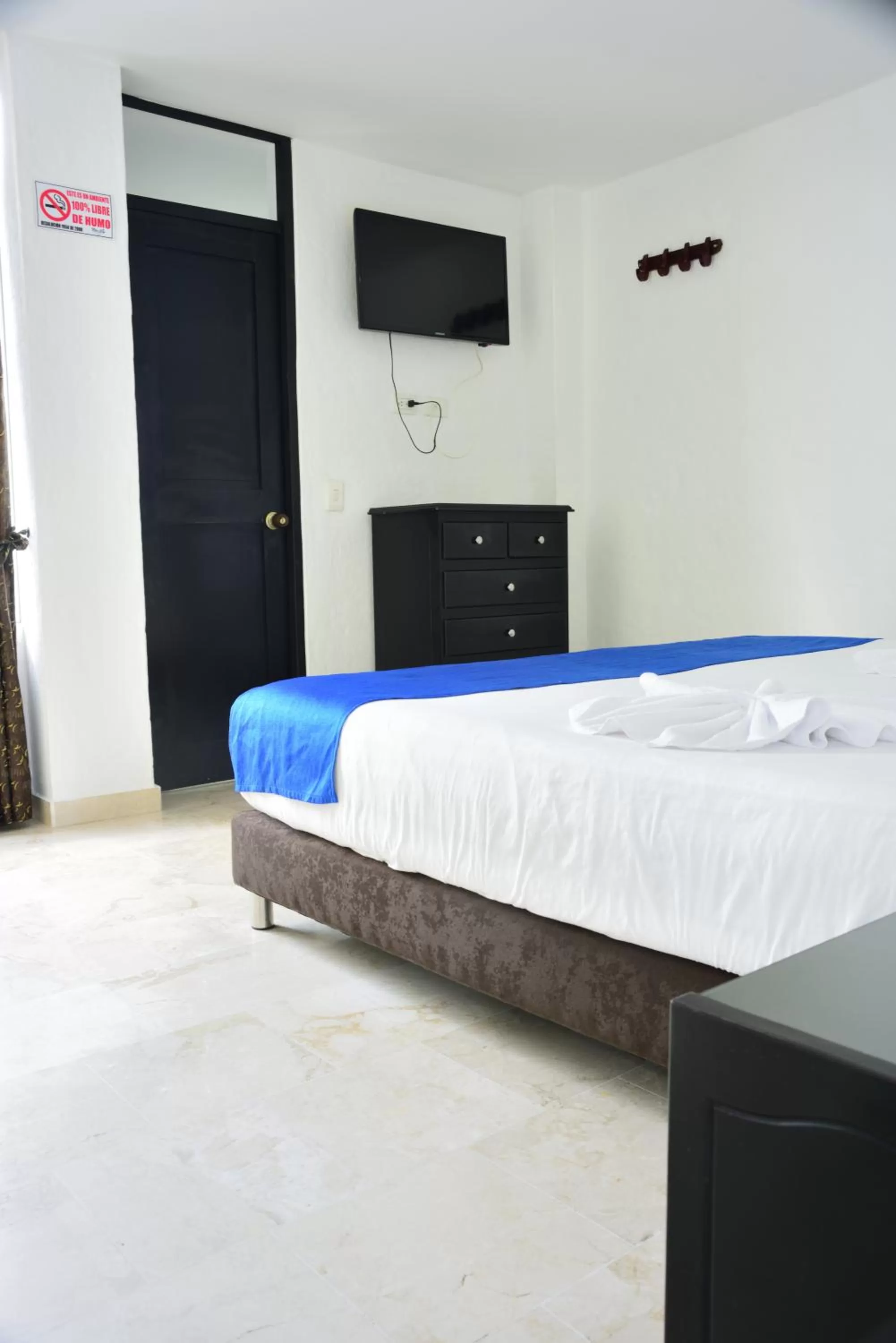 Bed in Blue Star Hotel