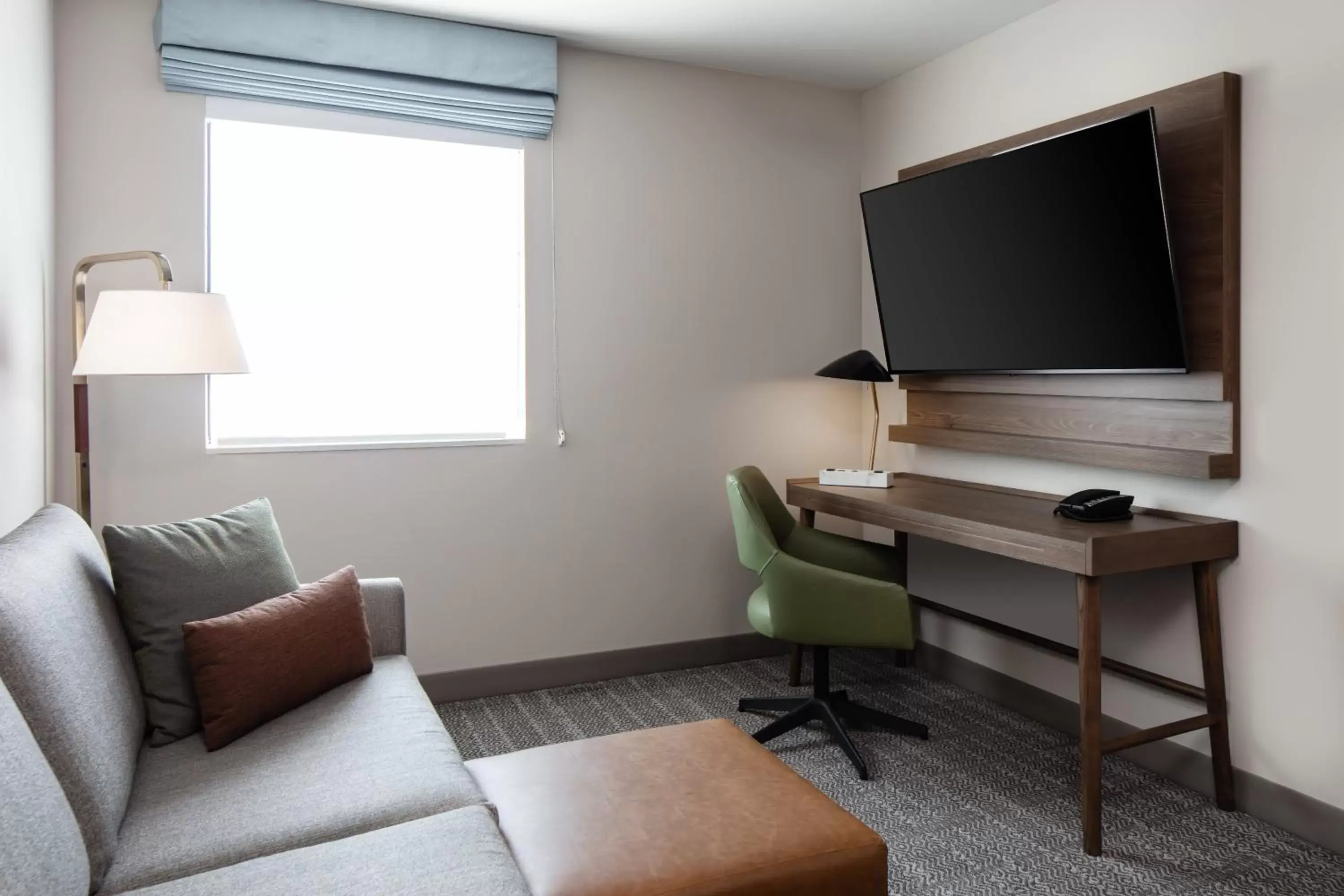 Bedroom, TV/Entertainment Center in Staybridge Suites - Iowa City - Coralville, an IHG Hotel