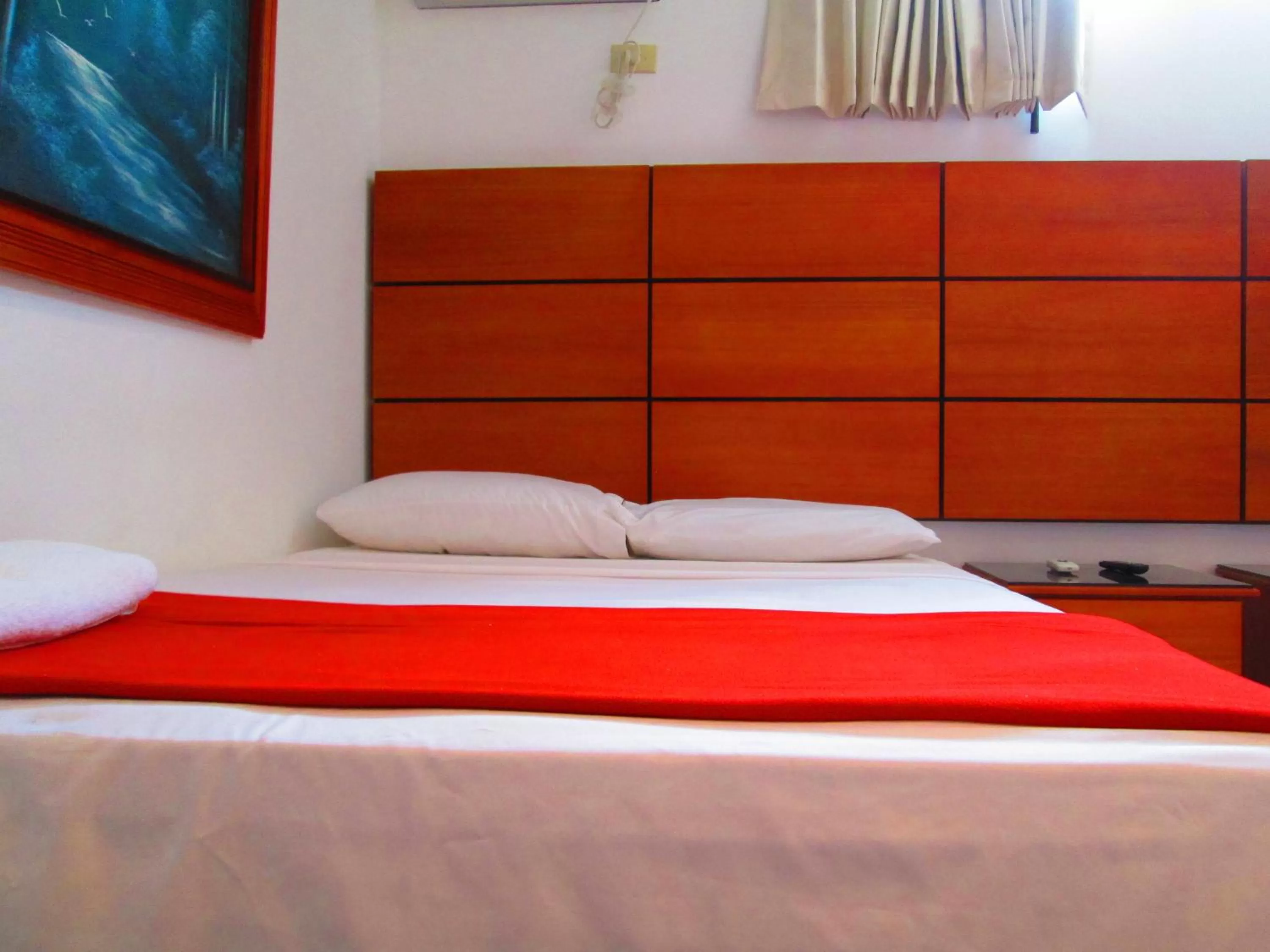 Photo of the whole room, Bed in Hotel Apart Guayaquil Aeropuerto