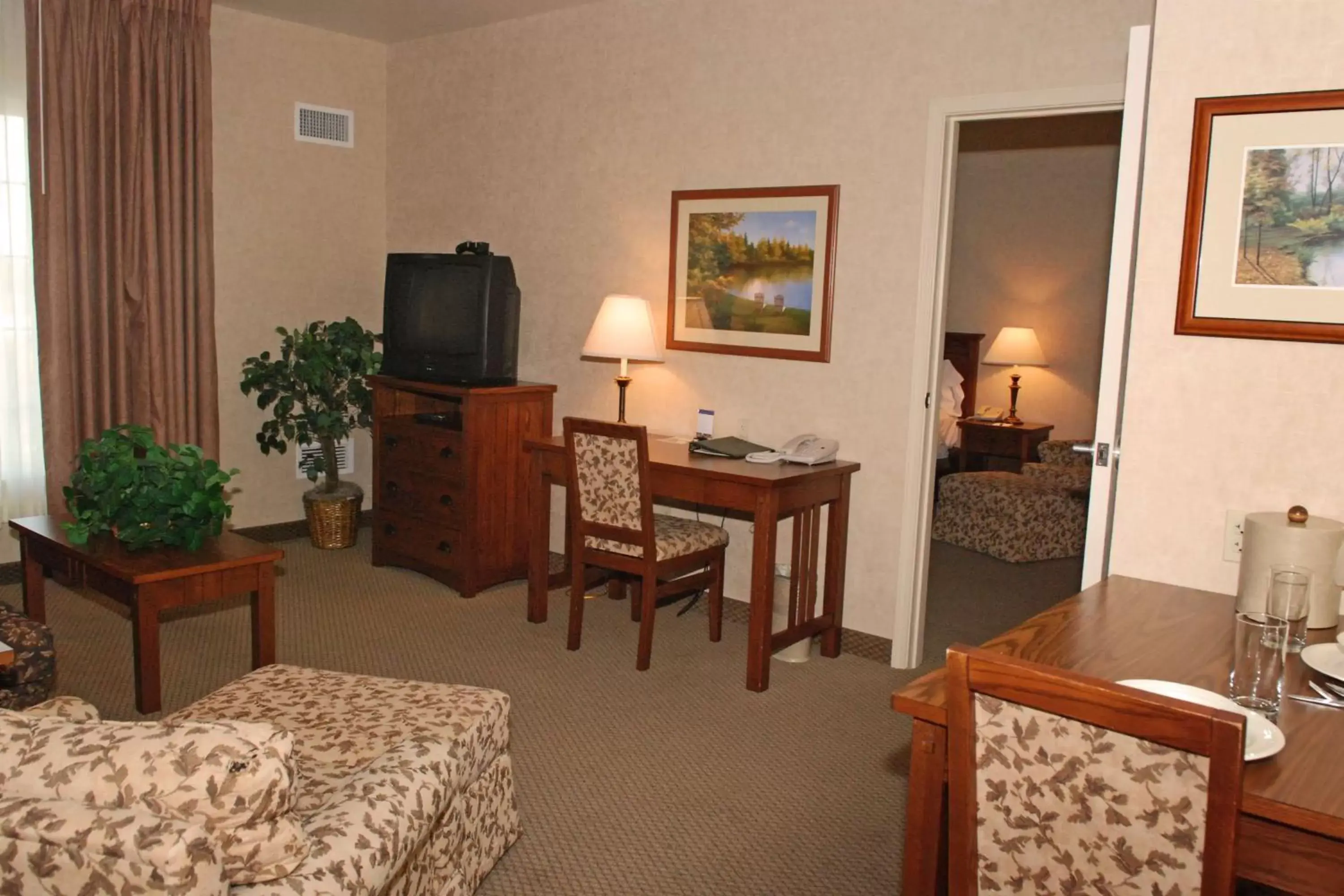 Bed, Seating Area in Homewood Suites Bakersfield
