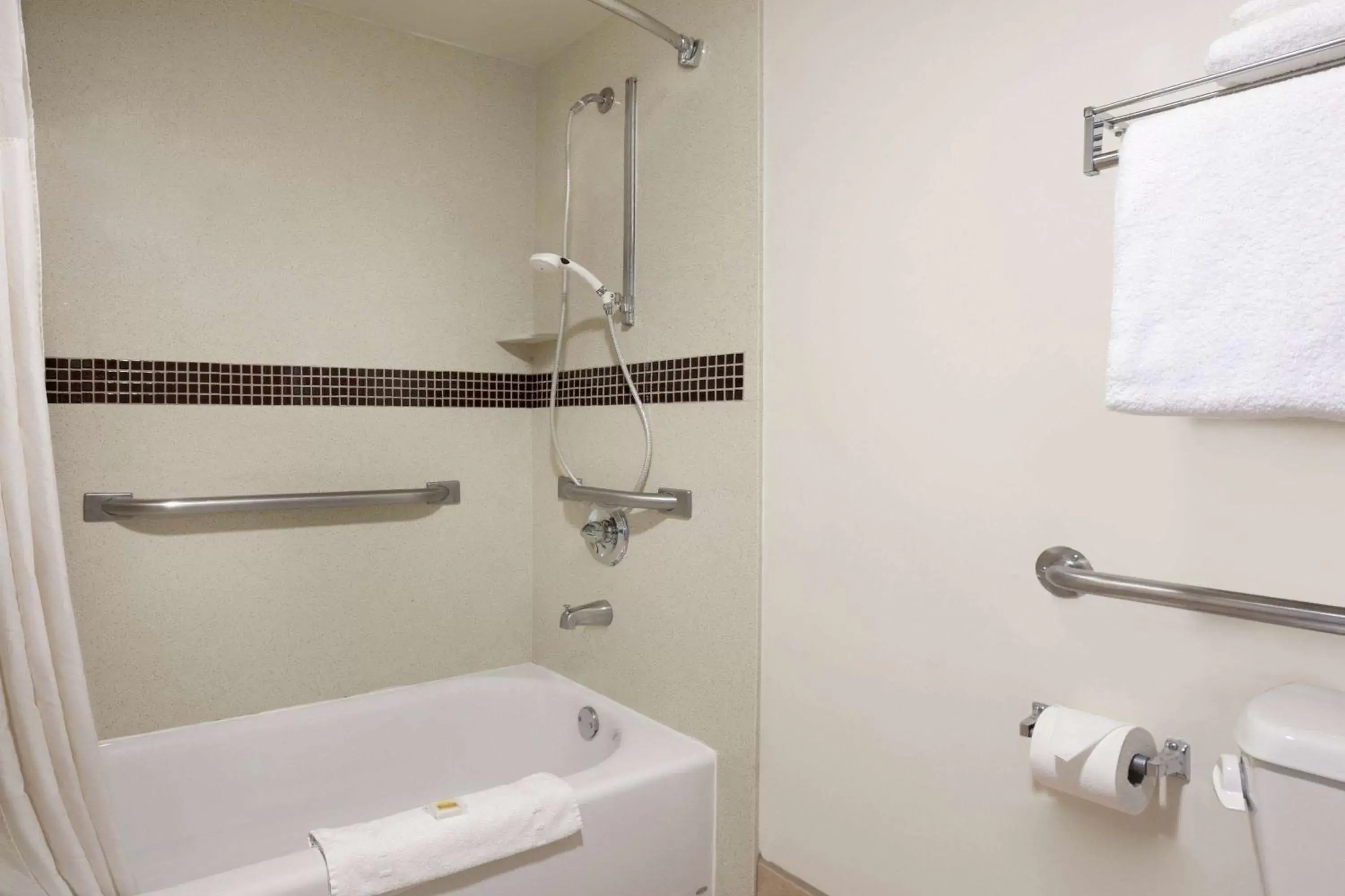 TV and multimedia, Bathroom in Days Inn & Suites by Wyndham Rancho Cordova
