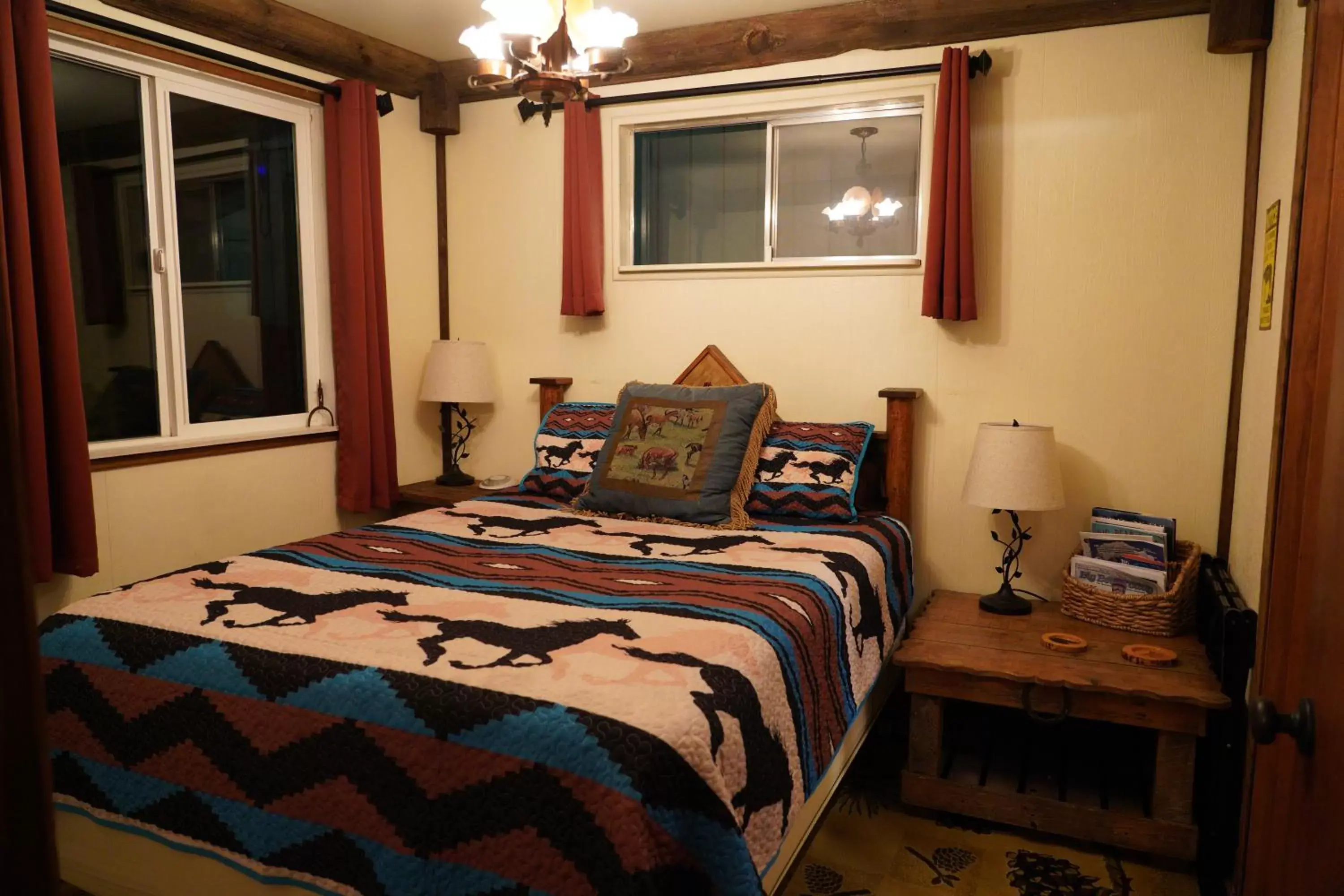 Bed in Hillcrest Suites & Cabins