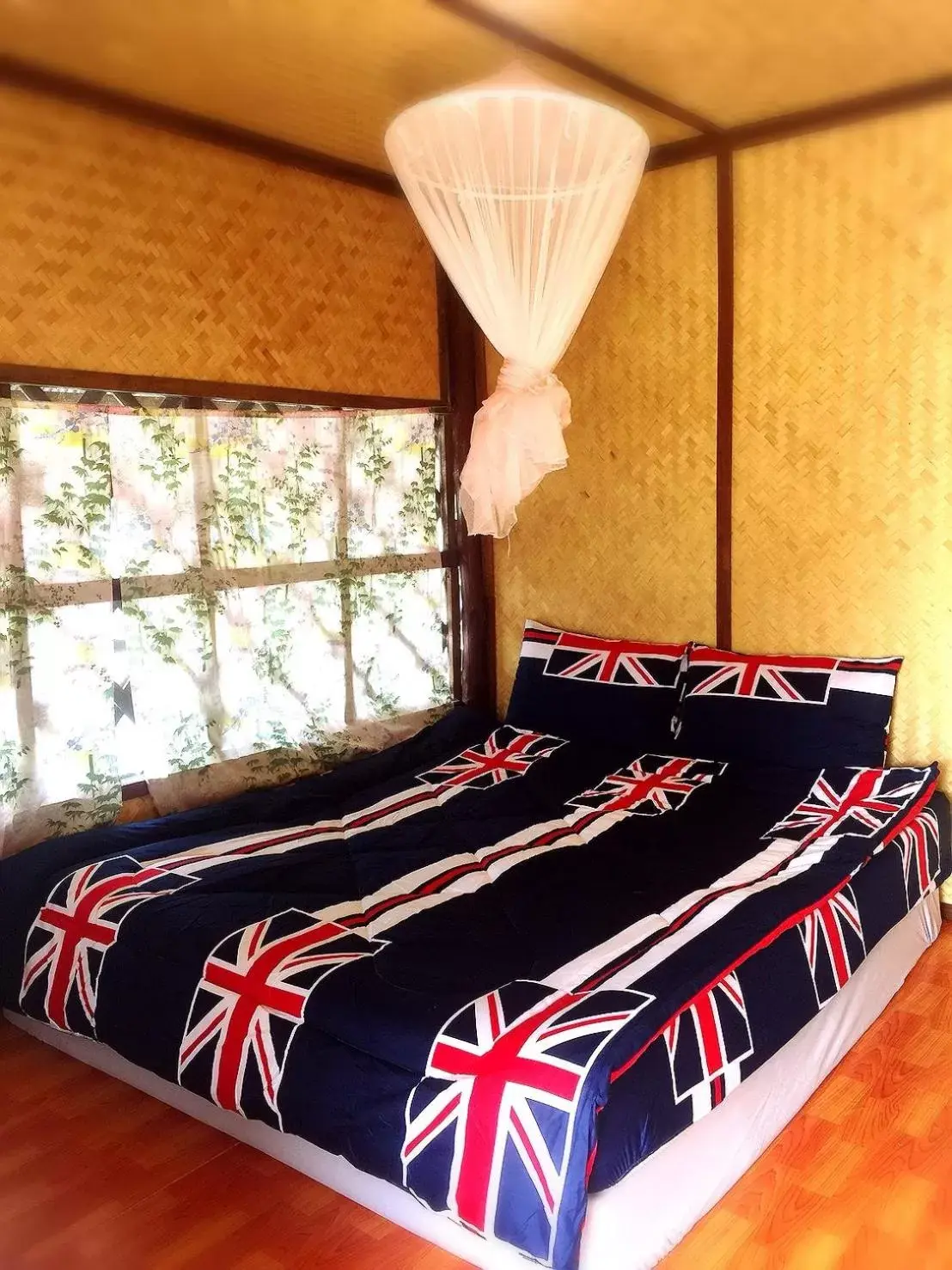 Bed in Bamboo House Resort