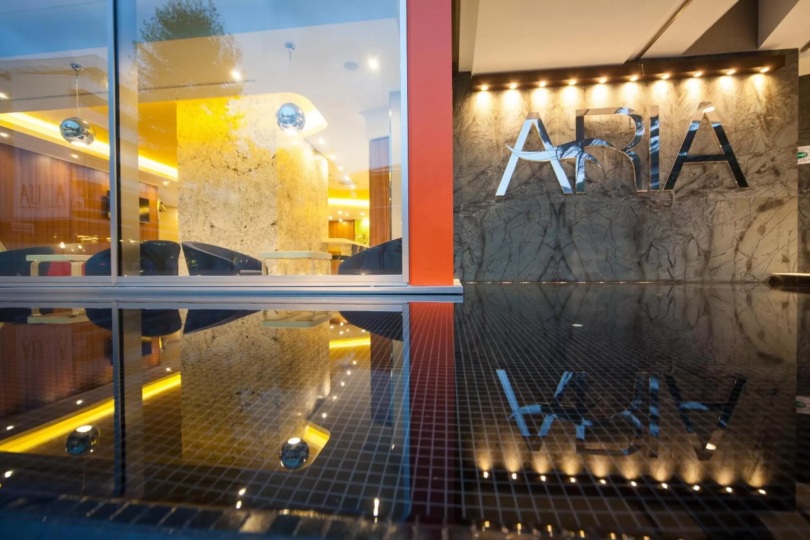 Facade/entrance, Swimming Pool in Hotel Aria