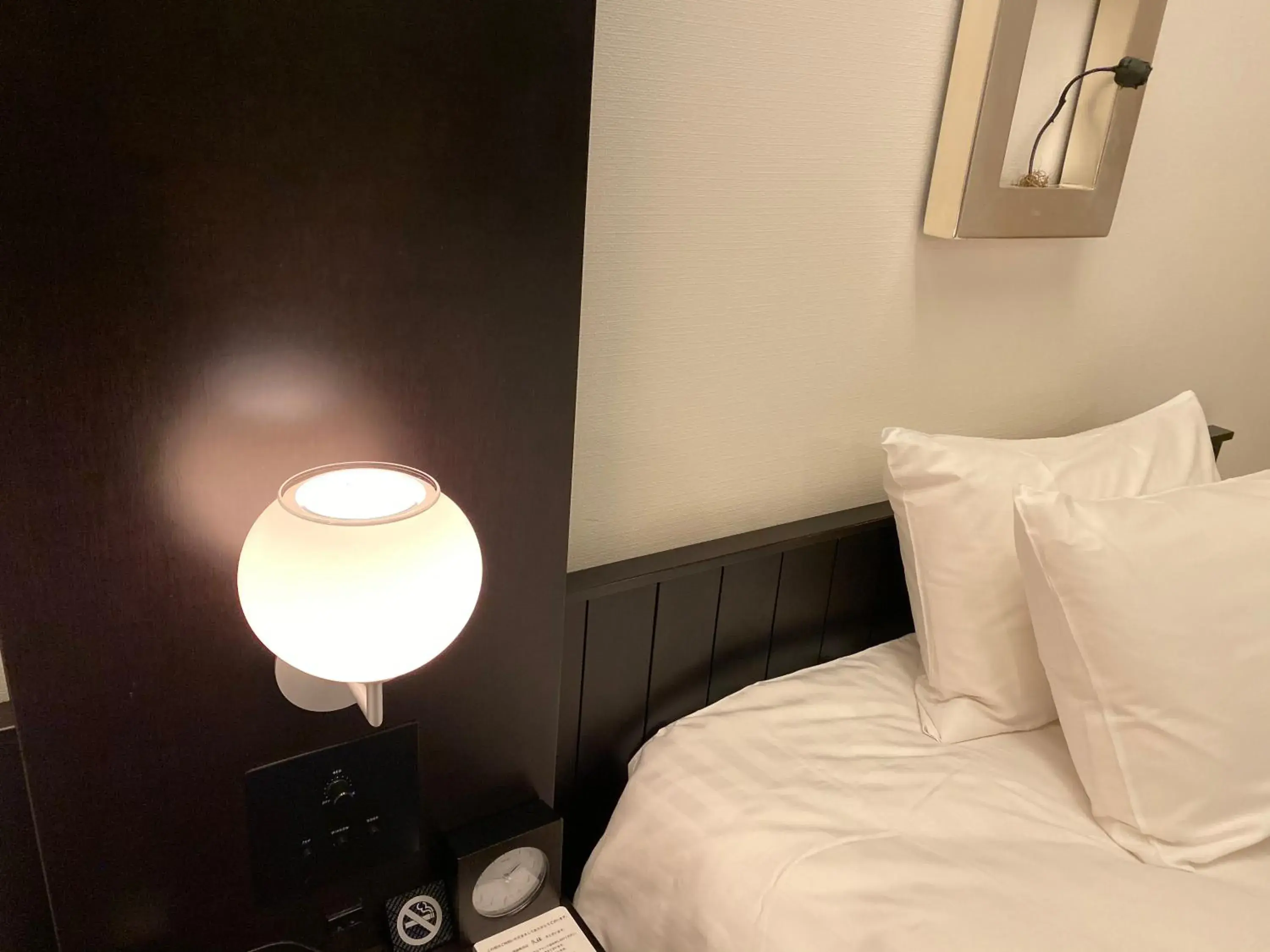 Bed in Furano Natulux Hotel