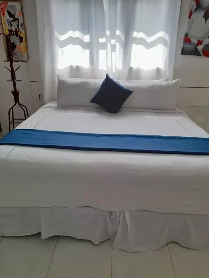 Bed in Beach Front TGR Hotels and Resorts