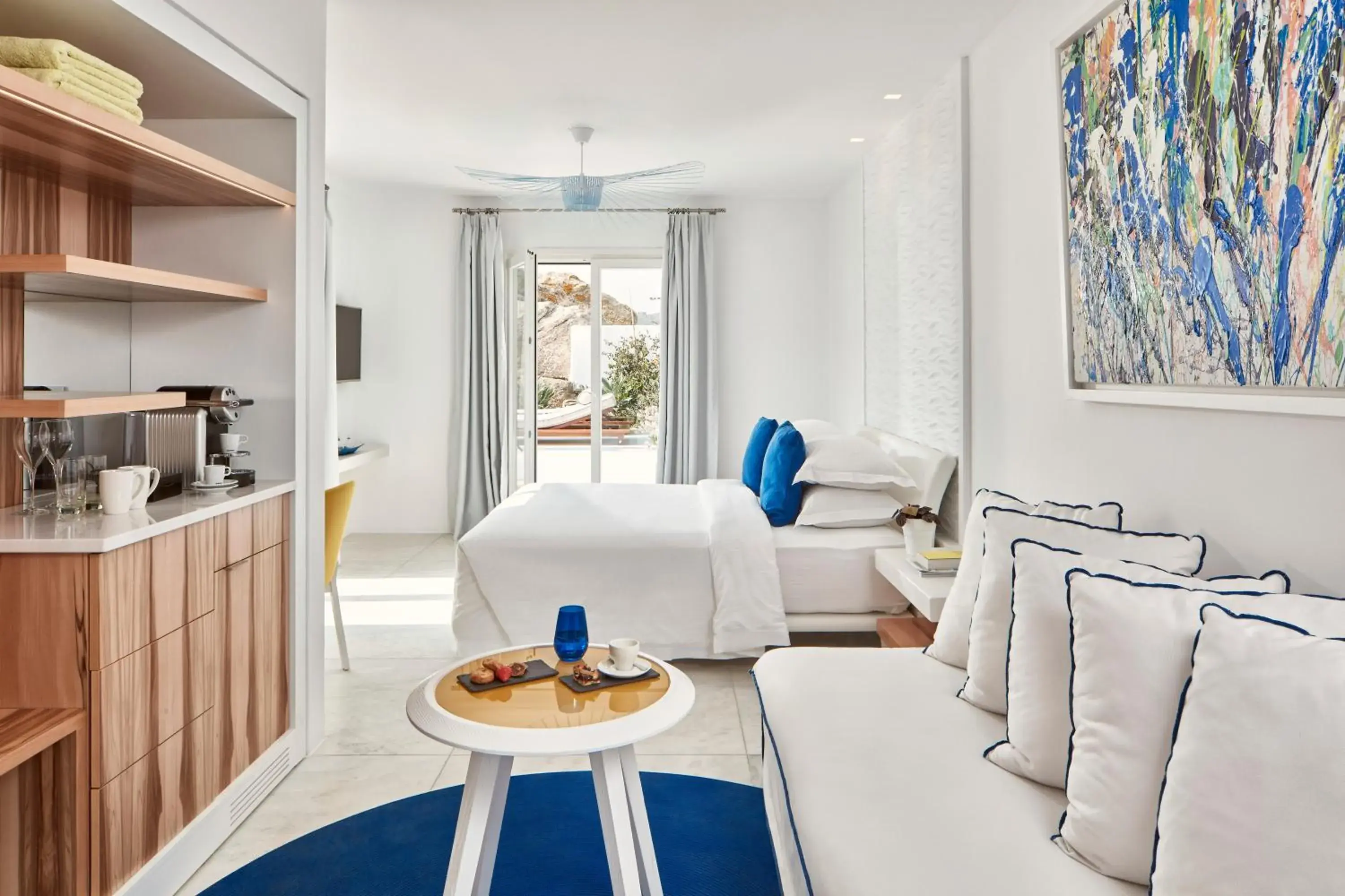 Bedroom in Myconian Ambassador Relais & Chateaux Bedroom in Myconian Ambassador Relais & Chateaux