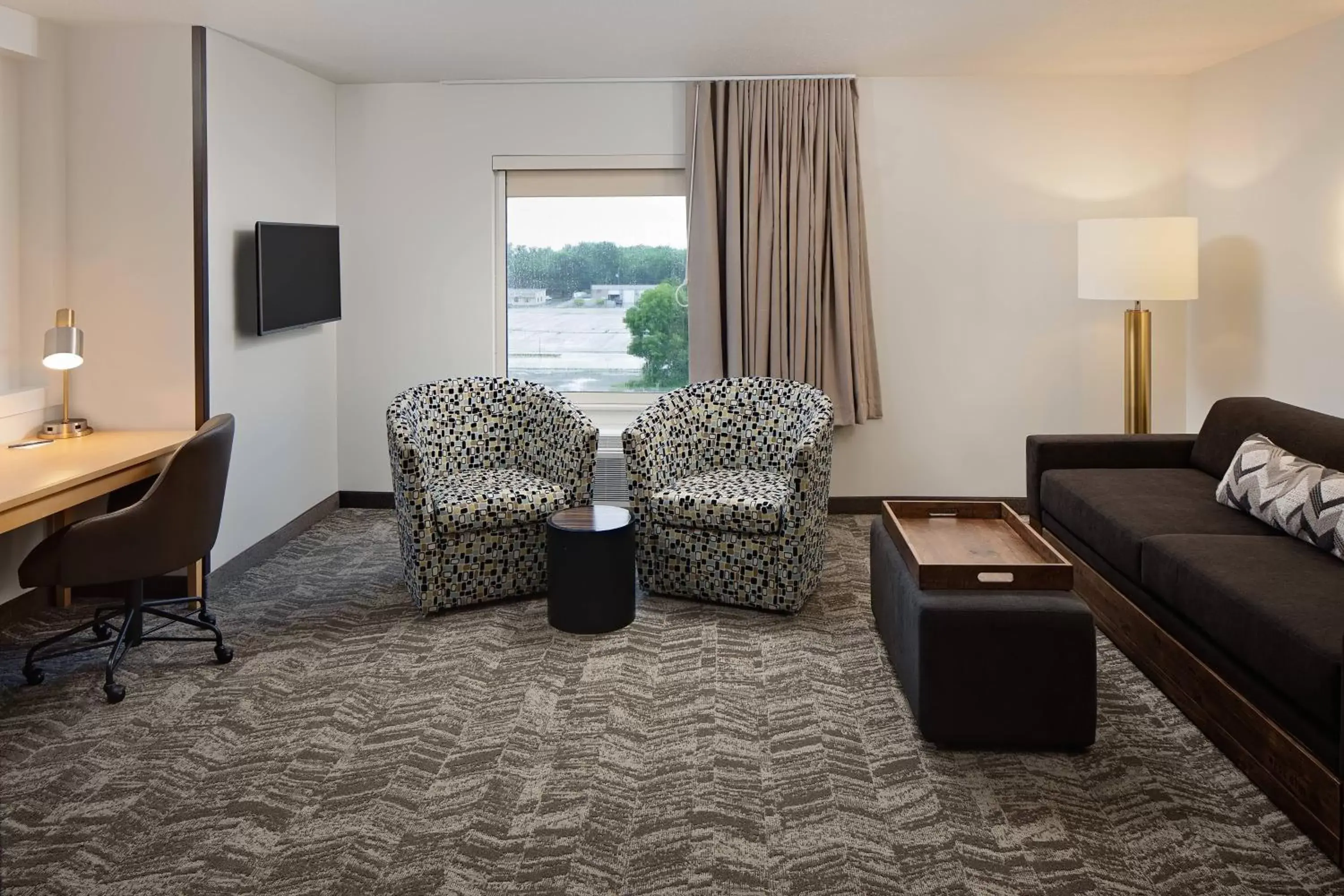 Living room, Seating Area in SpringHill Suites Green Bay