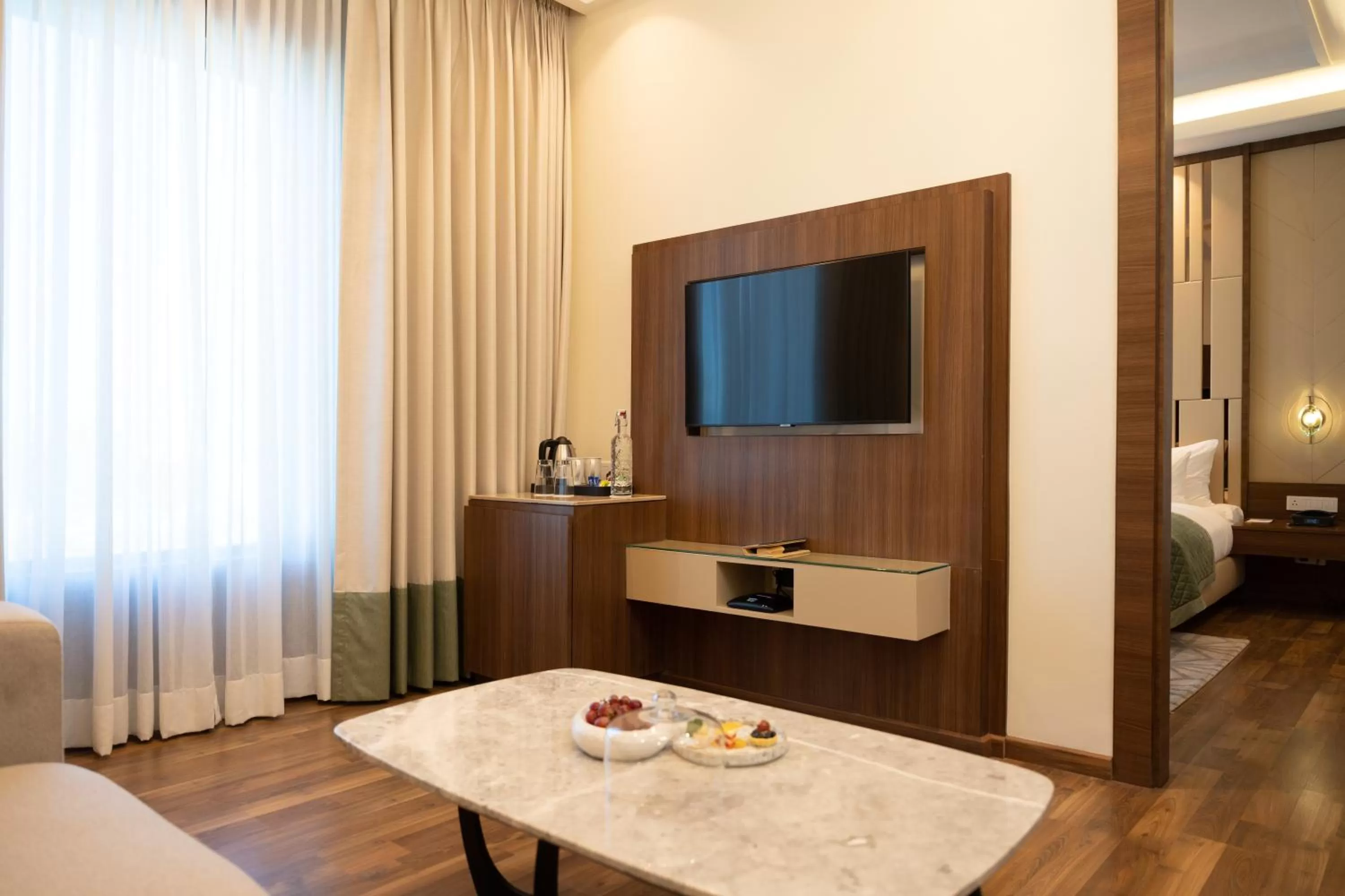 Living room, Bed in The Greenwood Guwahati - A Luxury Boutique Hotel