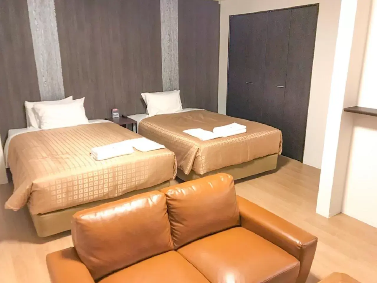 Bed in HOTEL LiVEMAX Takamatsu Eki Mae