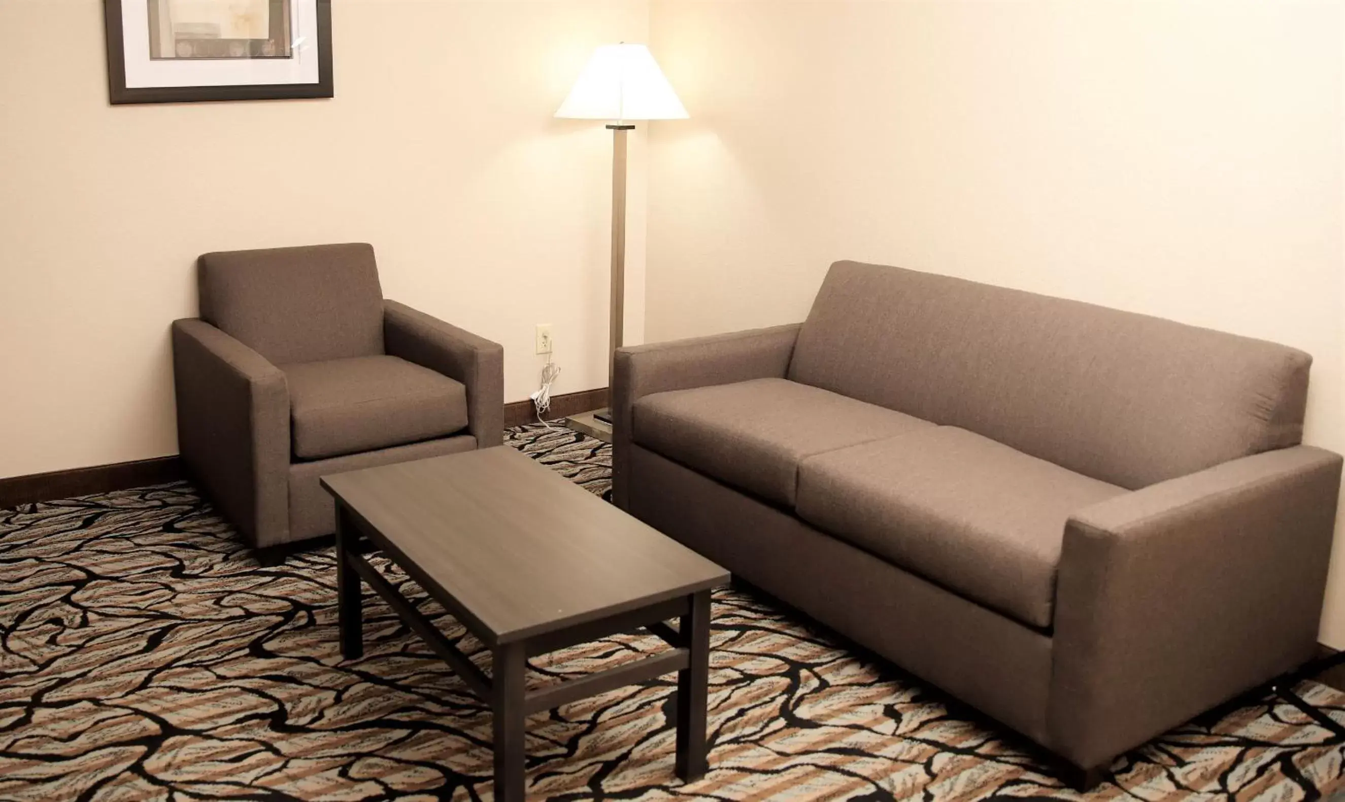 Living room, Seating Area in Baymont by Wyndham Jackson/Ridgeland